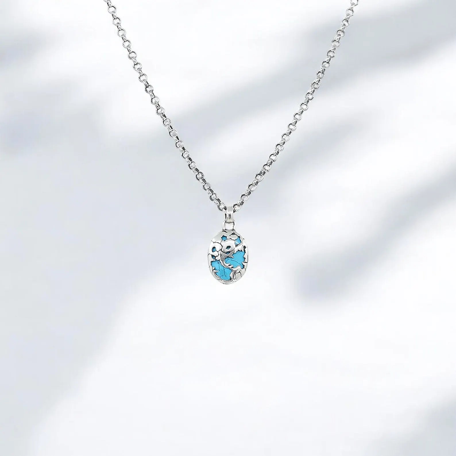 Elegant silver necklace with an oval turquoise pendant, made from high-quality sterling silver. Designed with a smooth 2.3mm thick chain and a 13g pendant, this timeless piece is ideal for birthdays, anniversaries, or holiday gifts.