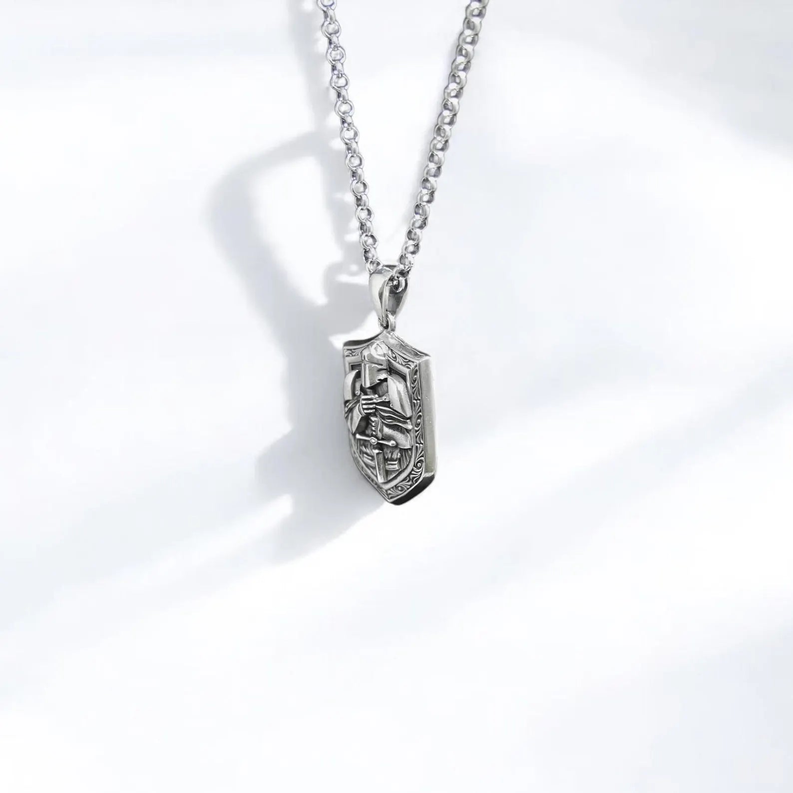 Gothic silver knight armor necklace pendant with shield-shaped design, detailed craftsmanship, and warrior motif. Ideal for fantasy, medieval reenactments, and men’s historical fashion. Strong, timeless, and perfect as a unique gift.