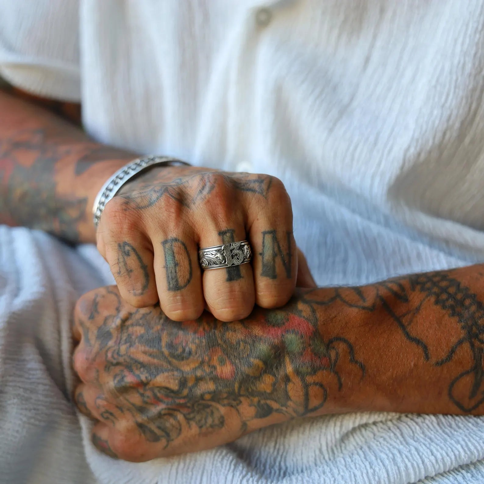 This Lucky 13 ring is a handcrafted silver band designed with gothic and biker aesthetics in mind. Featuring a raised "13" emblem and leaf-like engravings, it’s a powerful symbol of rebellion, luck, and personal strength. A great gift for fans of dark fashion, rockabilly style, or unique handmade jewelry.