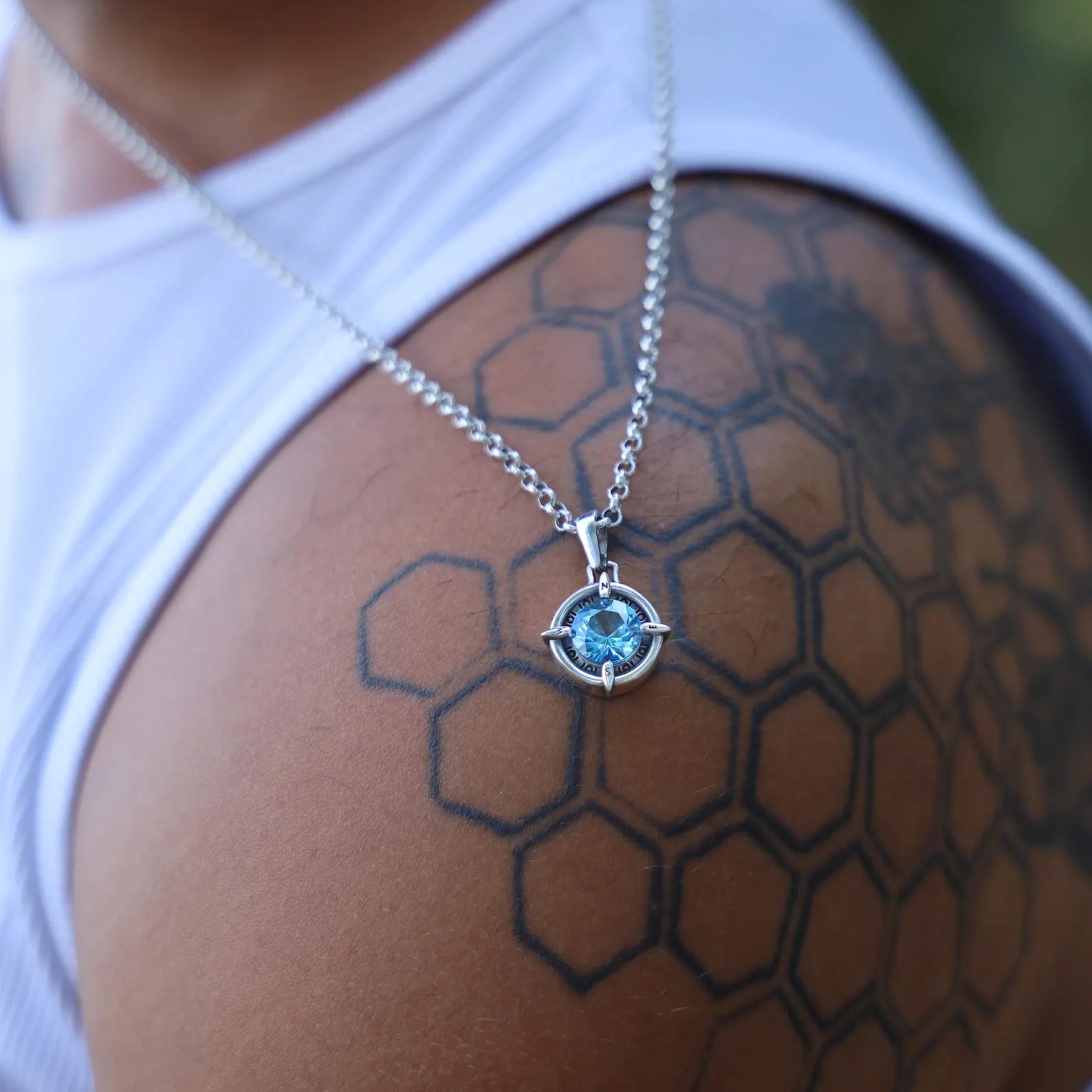 Aquamarine compass necklace in sterling silver, handmade for those who follow their dreams and journeys. The round aquamarine gemstone shines at the center of a nautical compass design, making it a thoughtful March birthstone gift. Perfect gift for travelers, sailors, and adventure seekers looking for meaningful handmade jewelry.