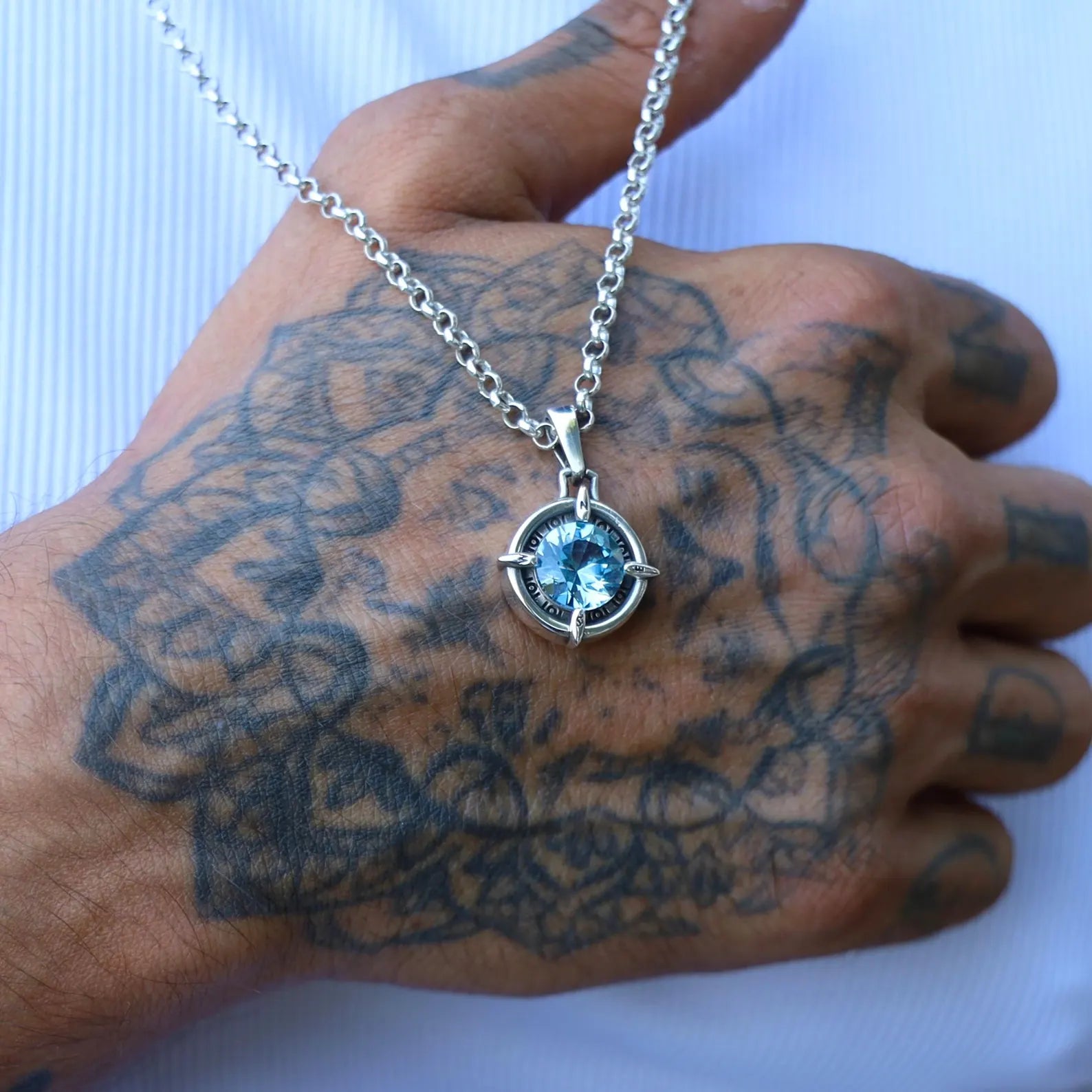 Handcrafted aquamarine compass pendant in 925 sterling silver, designed as a symbol of guidance and safe journeys. This nautical necklace makes a meaningful March birthstone gift for travelers and dreamers. A perfect jewelry gift for birthdays, anniversaries, and holidays. Ideal for lovers of the sea and unique handmade jewelry.