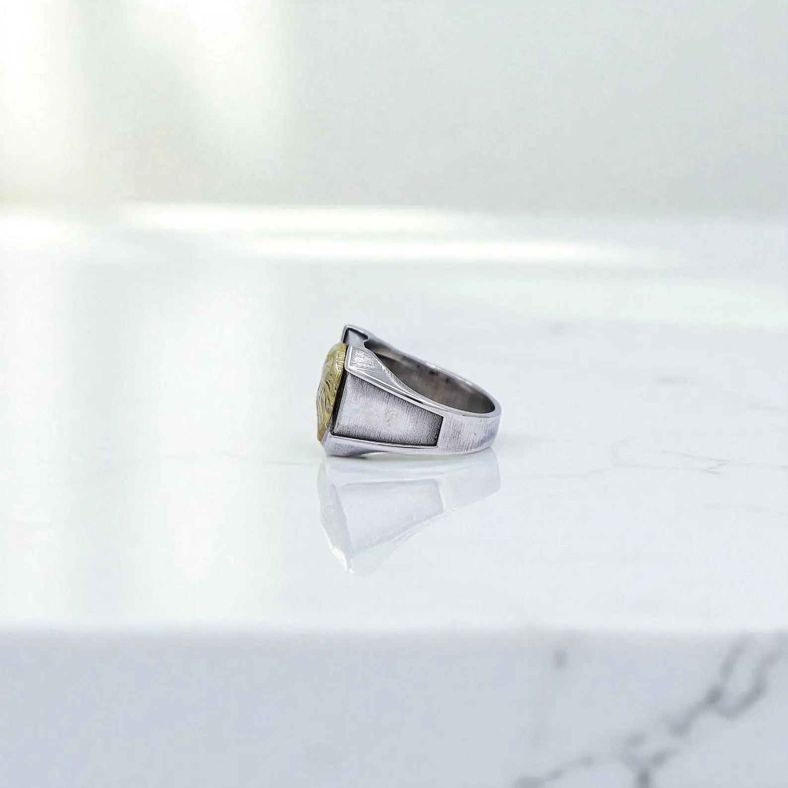 Bold statement jewelry for men: this sterling silver and gold-plated eagle ring is crafted as a pinky ring with rugged texture, polished edges, and symbolic power — designed for those who wear strength on their fingers.