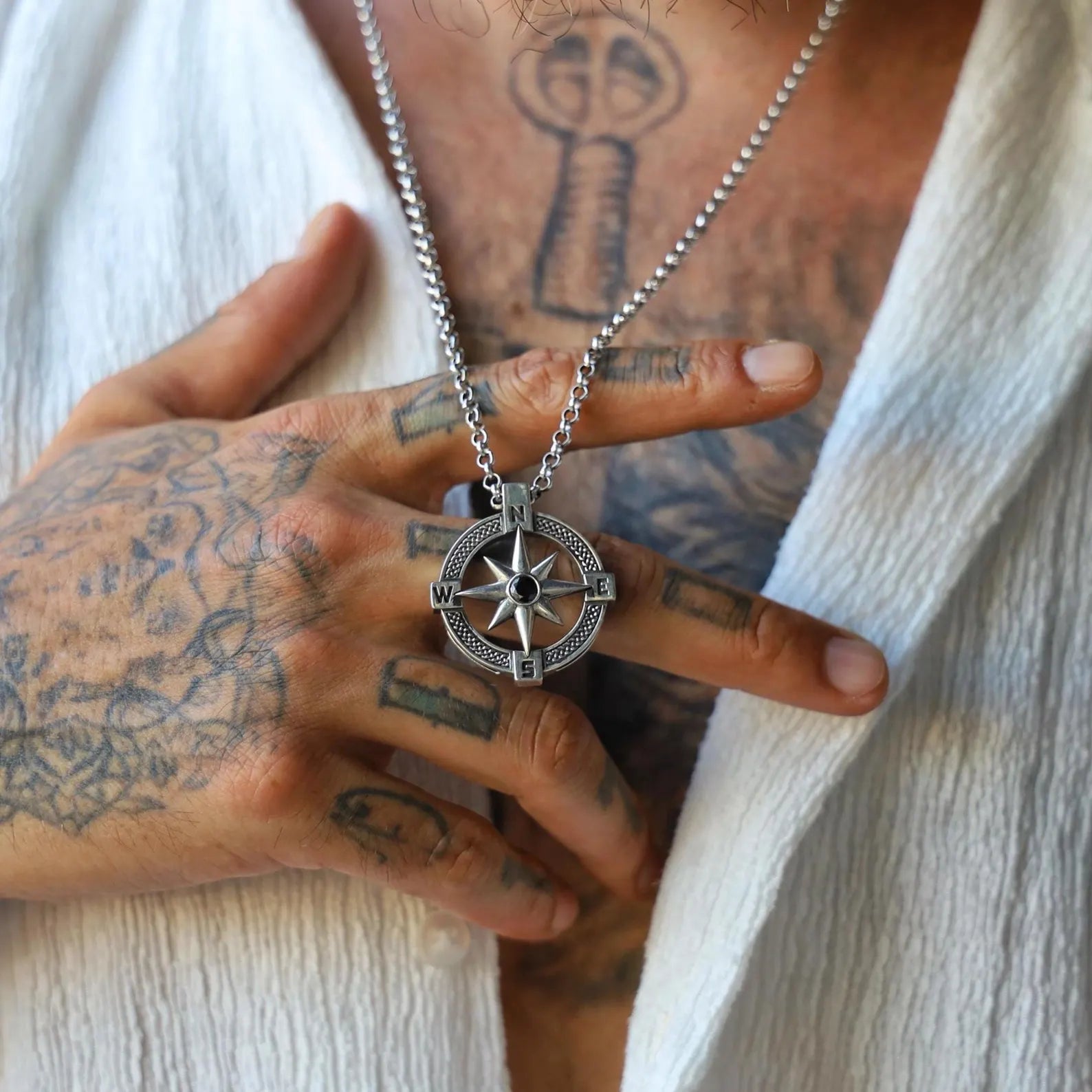 Handcrafted sterling silver North Star compass necklace with nautical inspiration. This timeless jewelry piece suits both men and women, symbolizing guidance, strength, and exploration. Perfect gift for travelers, ocean lovers, and adventurers. A stylish sterling silver pendant for him or her, wearable daily or as a meaningful jewelry gift.