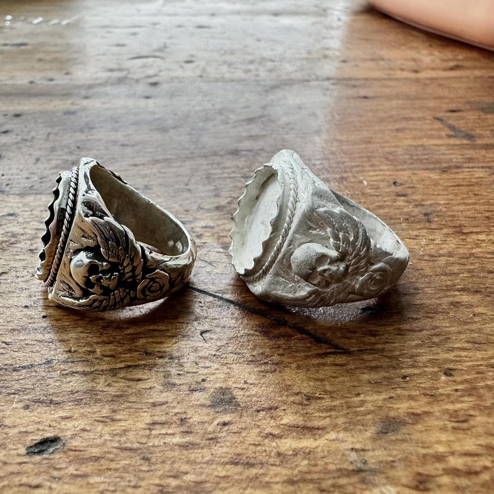 A handcrafted statement ring designed with a mystical blue labradorite stone and gothic skull motifs, symbolizing courage, transformation, and independence. Made from 925 silver, this piece blends craftsmanship and symbolism into a powerful fashion statement.