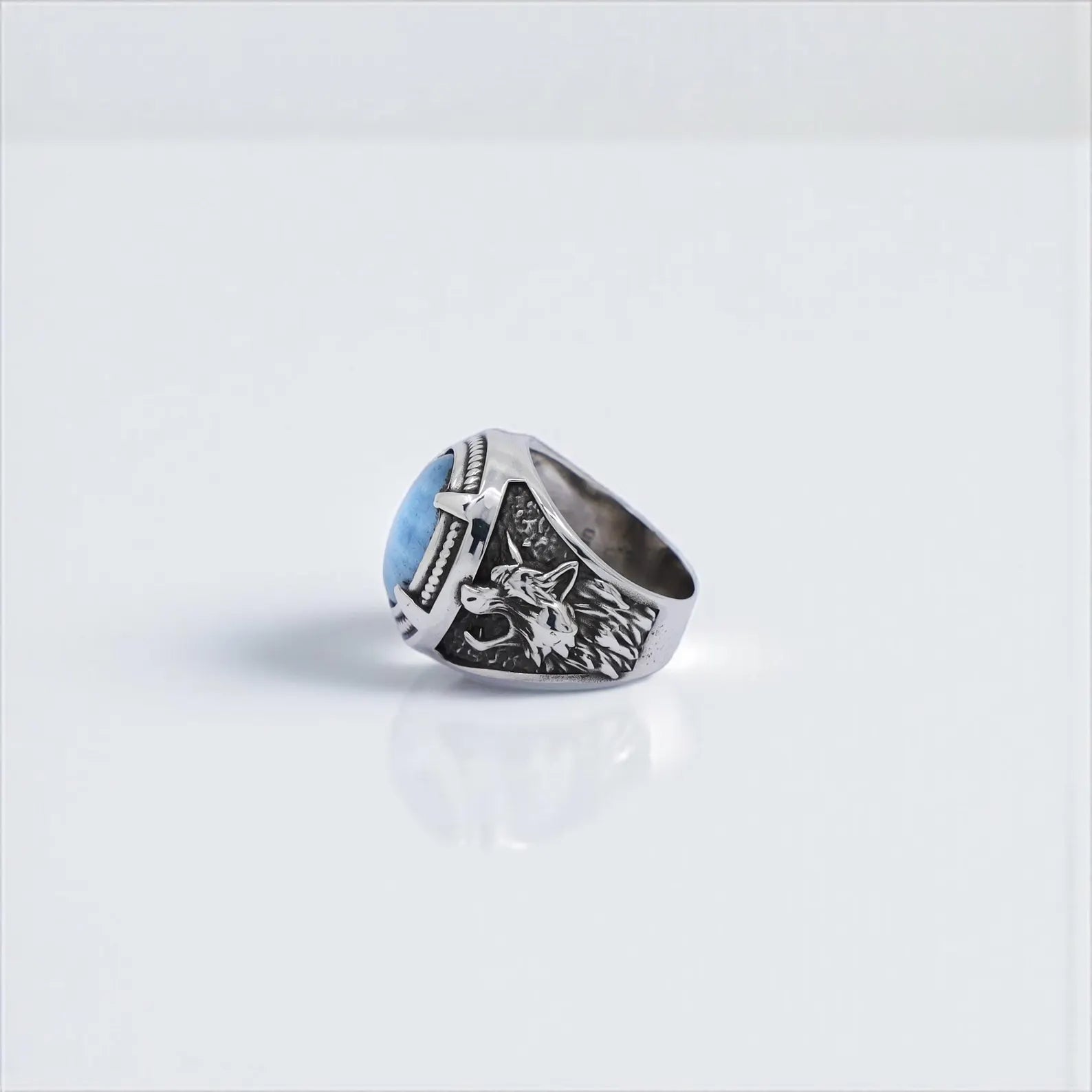 Handmade aquamarine stone wolf ring in sterling silver, designed with Viking warrior and Norse mythology themes. The wolf symbolizes protection and strength, while the aquamarine gemstone reflects calmness and clarity. Perfect men’s jewelry for everyday wear or as a statement Viking ring. Ideal gift for him on special occasions.