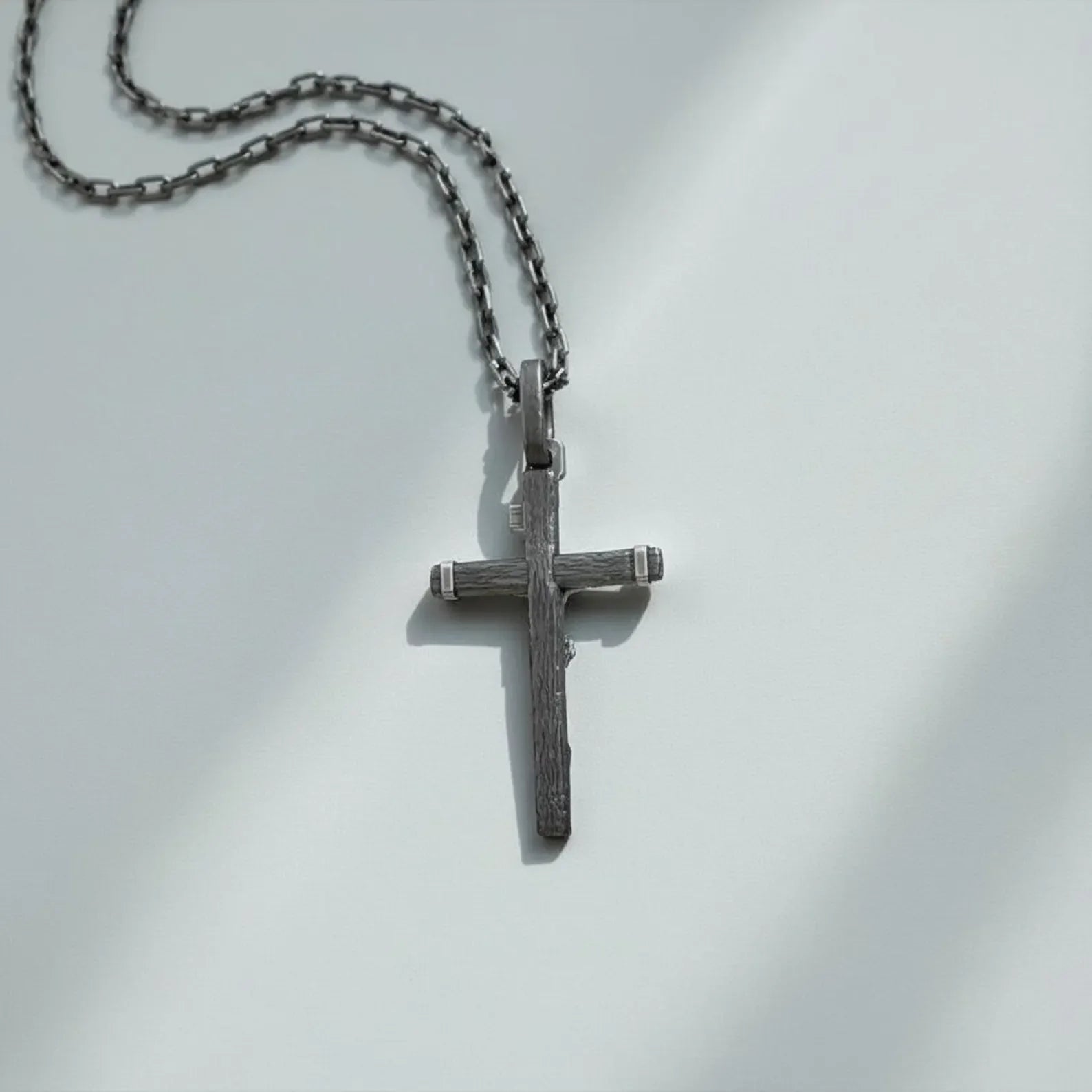 Handmade Christian cross necklace for men with INRI Jesus Christ crucifix, crafted in solid sterling silver as a meaningful religious statement jewelry