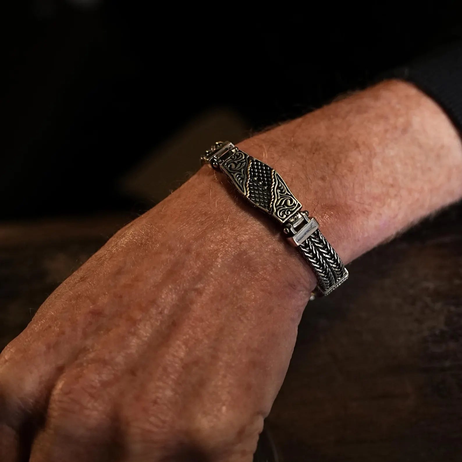 Handmade 925 sterling silver men’s bracelet with a detailed woven chain design and oxidized accents. This bracelet is a perfect balance of traditional craftsmanship and modern men’s jewelry fashion. A unique sterling silver accessory, making it a great gift for him on birthdays, anniversaries, or as a bold everyday piece.