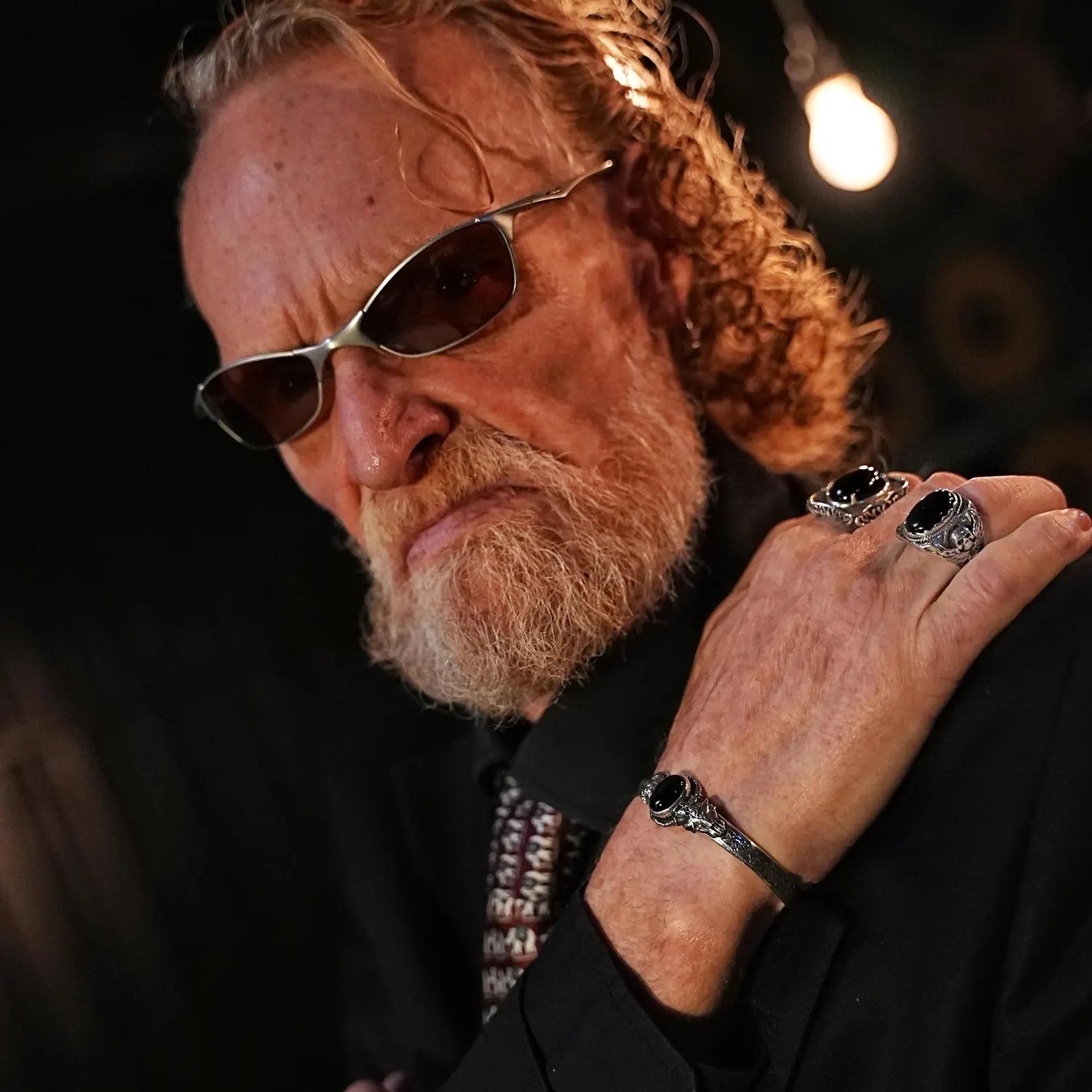 This bold men's silver ring showcases a gothic skull motif and black onyx gemstone, symbolizing power and individuality. The ring’s substantial weight and intricate detail make it a perfect gift for bikers, punk enthusiasts, or lovers of dark, expressive fashion.