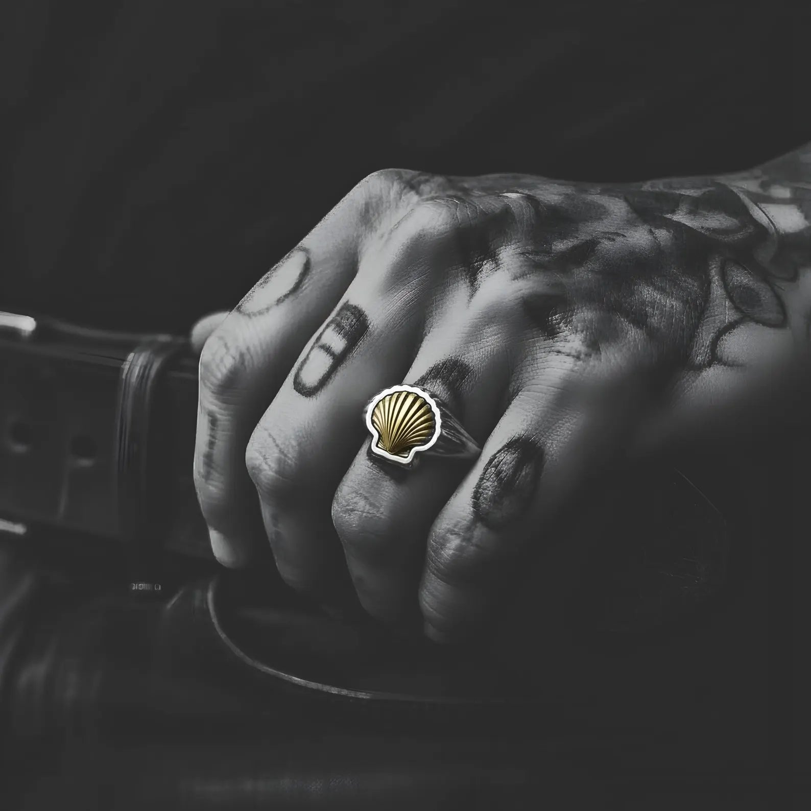 Seashell signet ring made of sterling silver and gold accent, maritime inspired jewelry symbolizing protection and journey