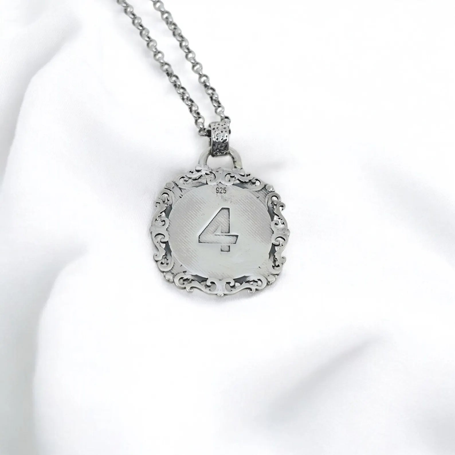 Detailed shot highlighting the substantial 42-gram weight, 39.87mm diameter, 59.94mm height, and 2.54mm thickness of this sterling silver compass pendant. With a sturdy 2.3mm chain, this men’s compass necklace combines rugged durability and refined style, making it a perfect choice for those who value strength, elegance, and the symbolism of travel and discovery.