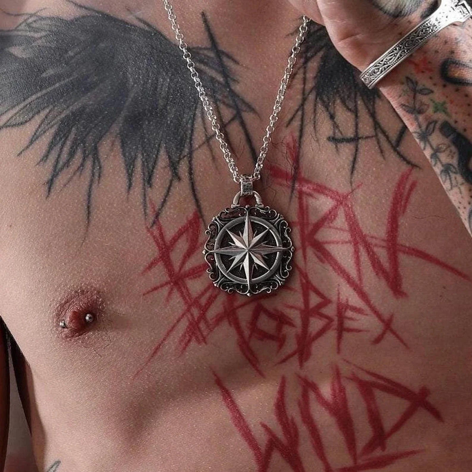 Styled on the neck, this sterling silver compass necklace adds a touch of nautical elegance and bohemian travel spirit to any outfit. The perfect statement piece for modern men and women who embrace the journey and the mystique of the ocean, this compass pendant necklace is an essential accessory for alternative fashion lovers and spiritual seekers who appreciate meaningful jewelry.