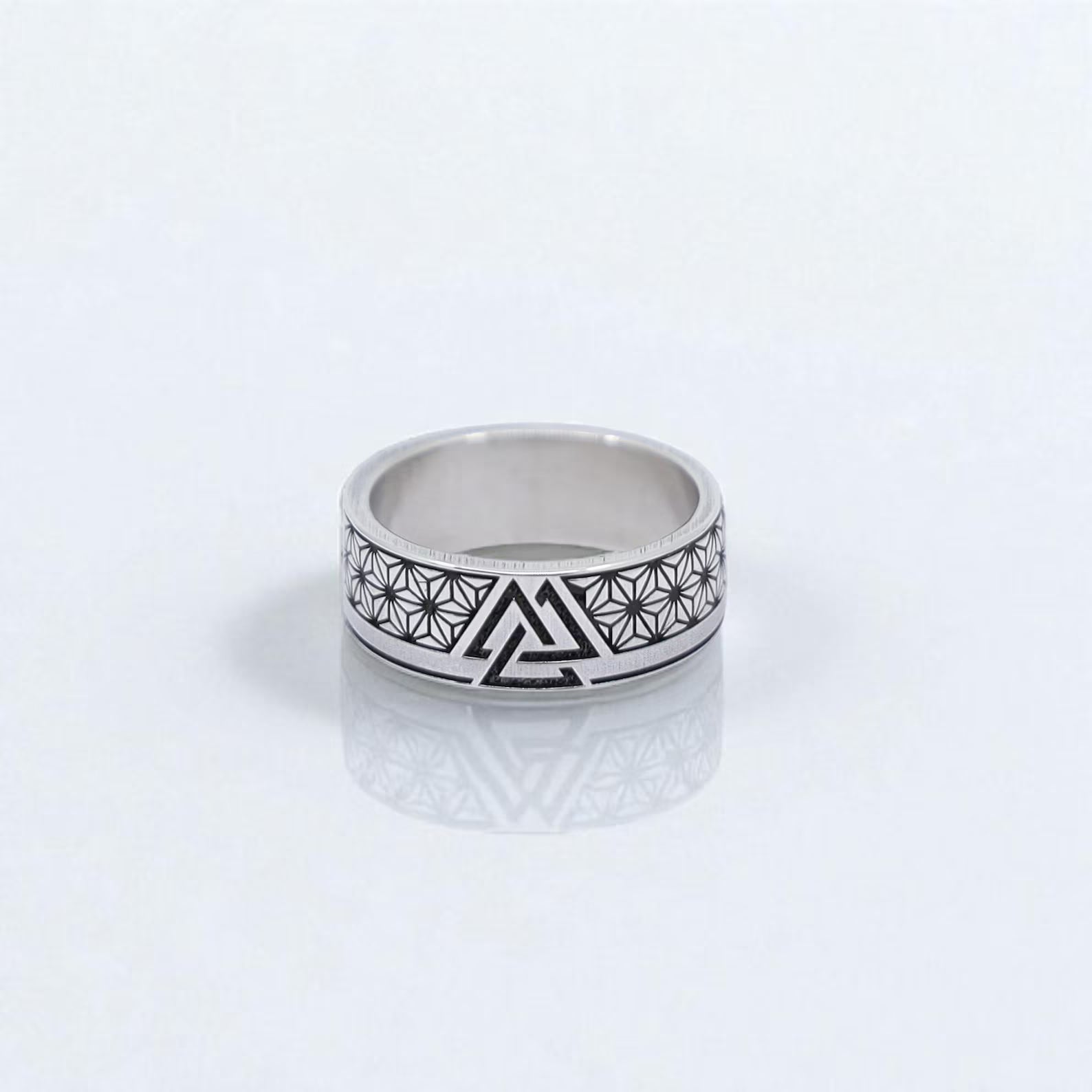 Handcrafted Norse Valknut ring for men, made from solid 925 sterling silver and engraved with the iconic Valknut symbol representing strength, honor, and Odin’s protection. This Viking-style band blends geometric minimalism with deep mythological meaning, making it a perfect gift for fans of Norse heritage and Nordic warrior culture.