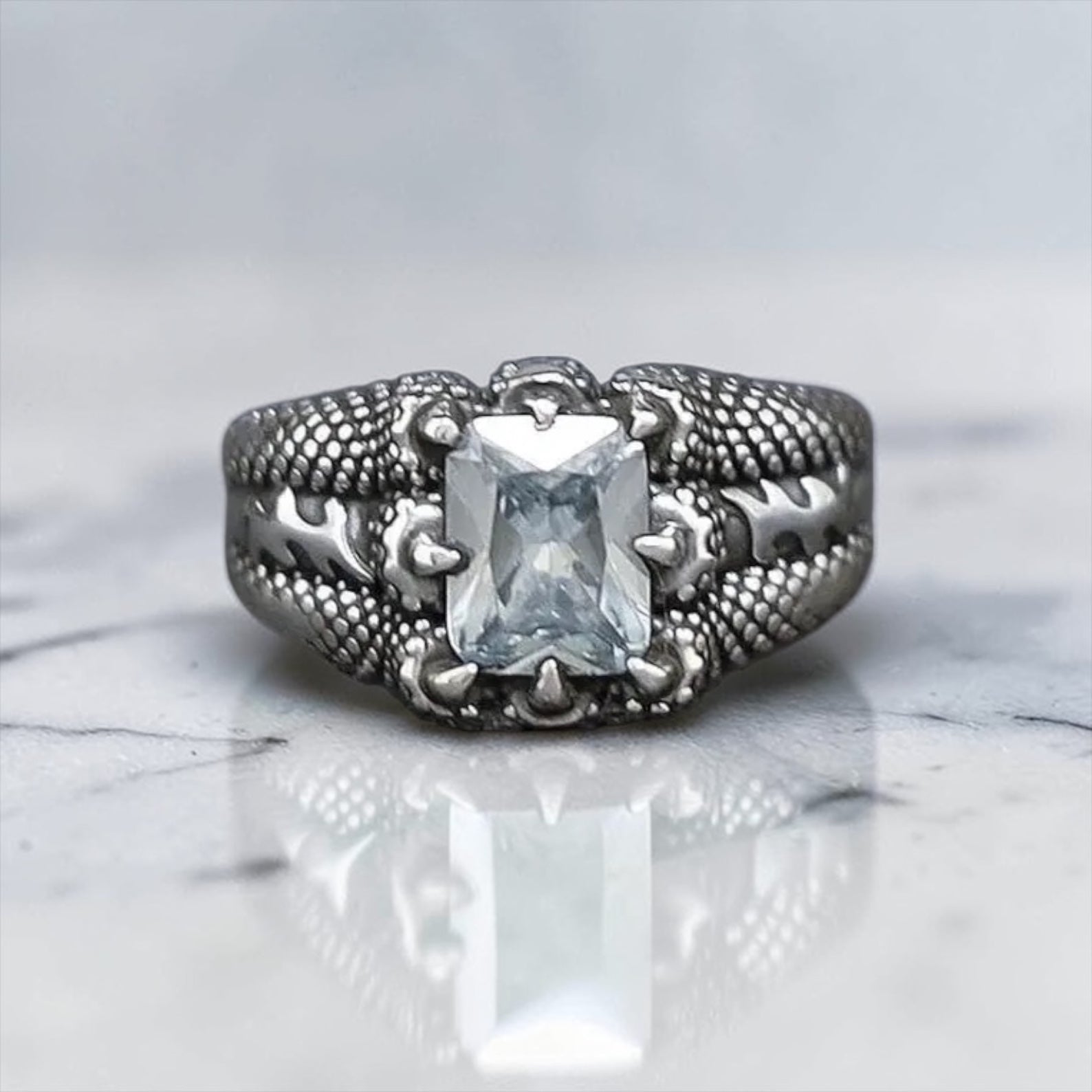 Handcrafted sterling silver aquamarine ring featuring a bold claw setting that enhances the gemstone’s brilliant blue color, perfect as a March birthstone jewelry gift.