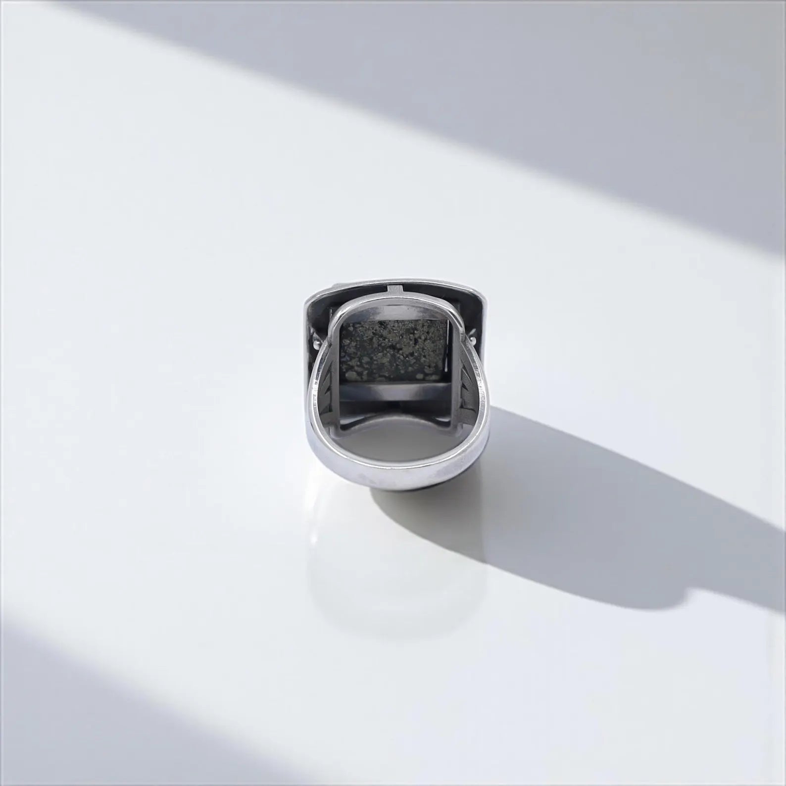 A handcrafted Nordic ring with a vibrant turquoise center and engraved runes symbolizing Viking strength and legacy. Made for men who value craftsmanship and ancient lore. Works perfectly on Instagram galleries, Pinterest Norse gift boards, and Shopify Norsemen product collections.