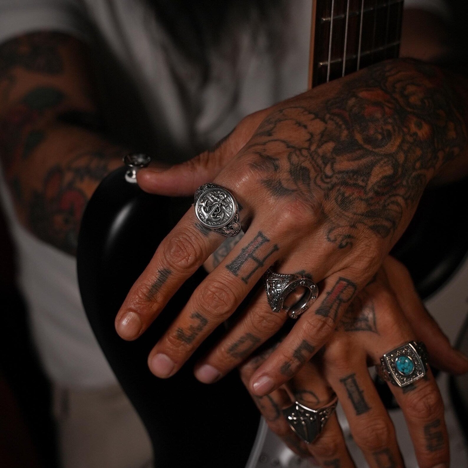 Placed on deep navy fabric, the anchor ring pops with contrast and oceanic energy. This visual emphasizes its nautical roots, making it an ideal gift for anyone passionate about the sea, sailing, or maritime heritage.