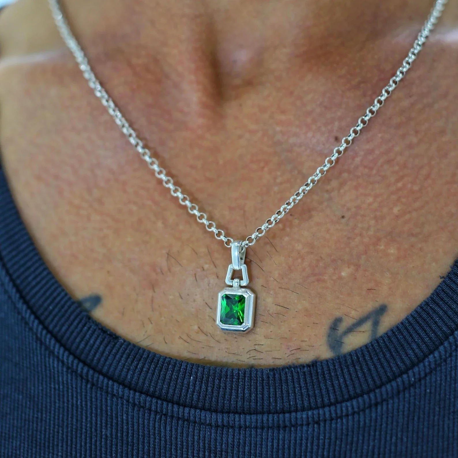 Elevate any ensemble with this exquisite sterling silver green stone necklace, designed around a stunning emerald-cut pendant that captures light and attention. The handcrafted design and premium materials ensure it stands out as both a fashion statement and a heartfelt gift. Ideal for anniversaries, birthdays, or holiday surprises for someone with a refined taste in jewelry.