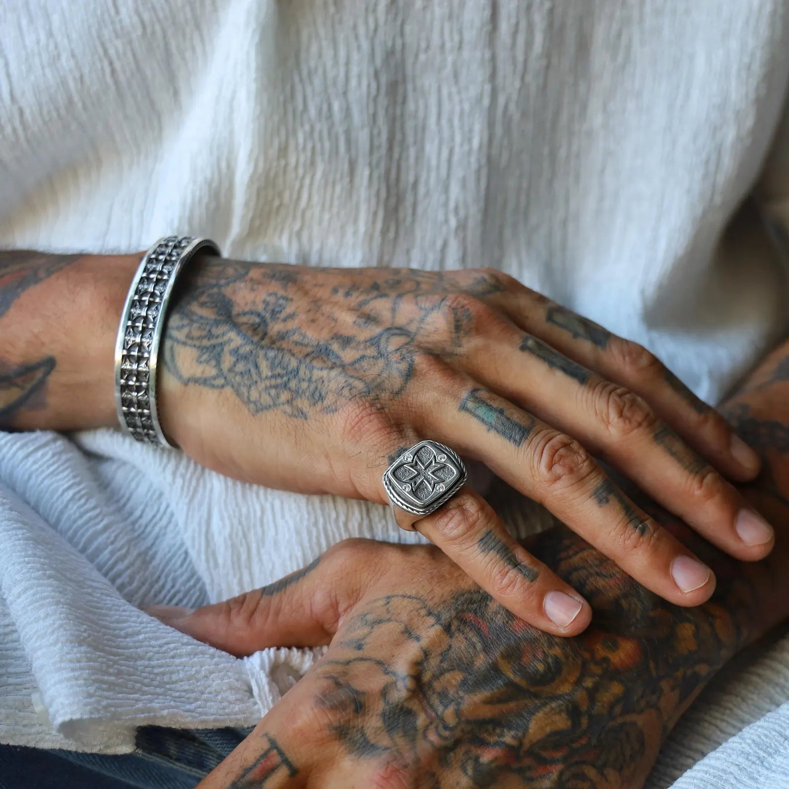 Christian signet ring for men handcrafted in solid 925 sterling silver, featuring a centered cross emblem on a smooth, rounded face, perfect for daily wear, religious ceremonies, or as a gift symbolizing faith and devotion.