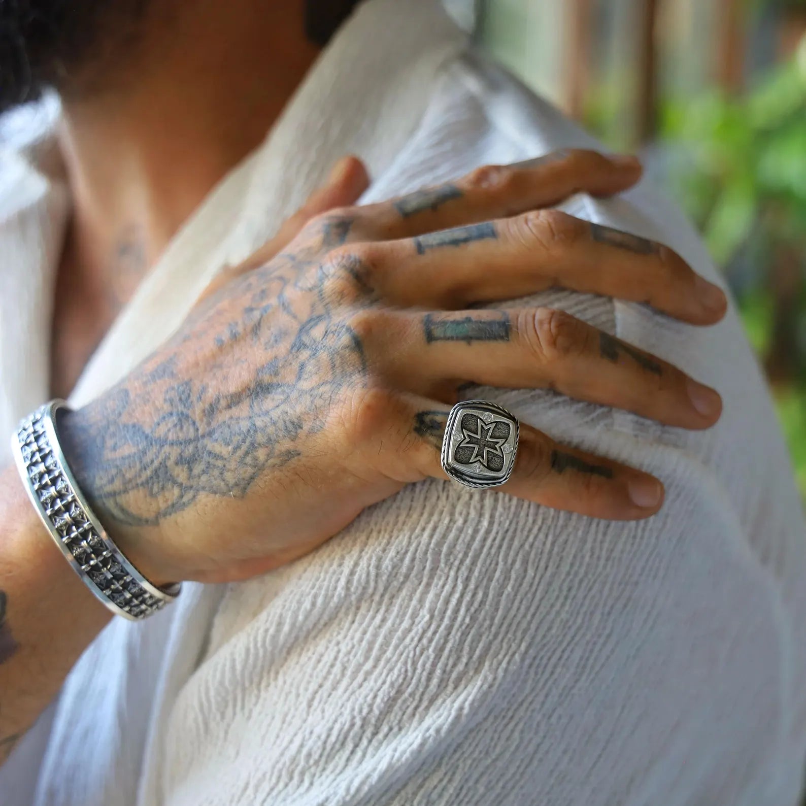 Sterling silver men’s pinky ring with a raised cross symbol, reflecting faith and spiritual strength, handmade with care and timeless elegance for those seeking Christian-inspired jewelry with a classic masculine touch.