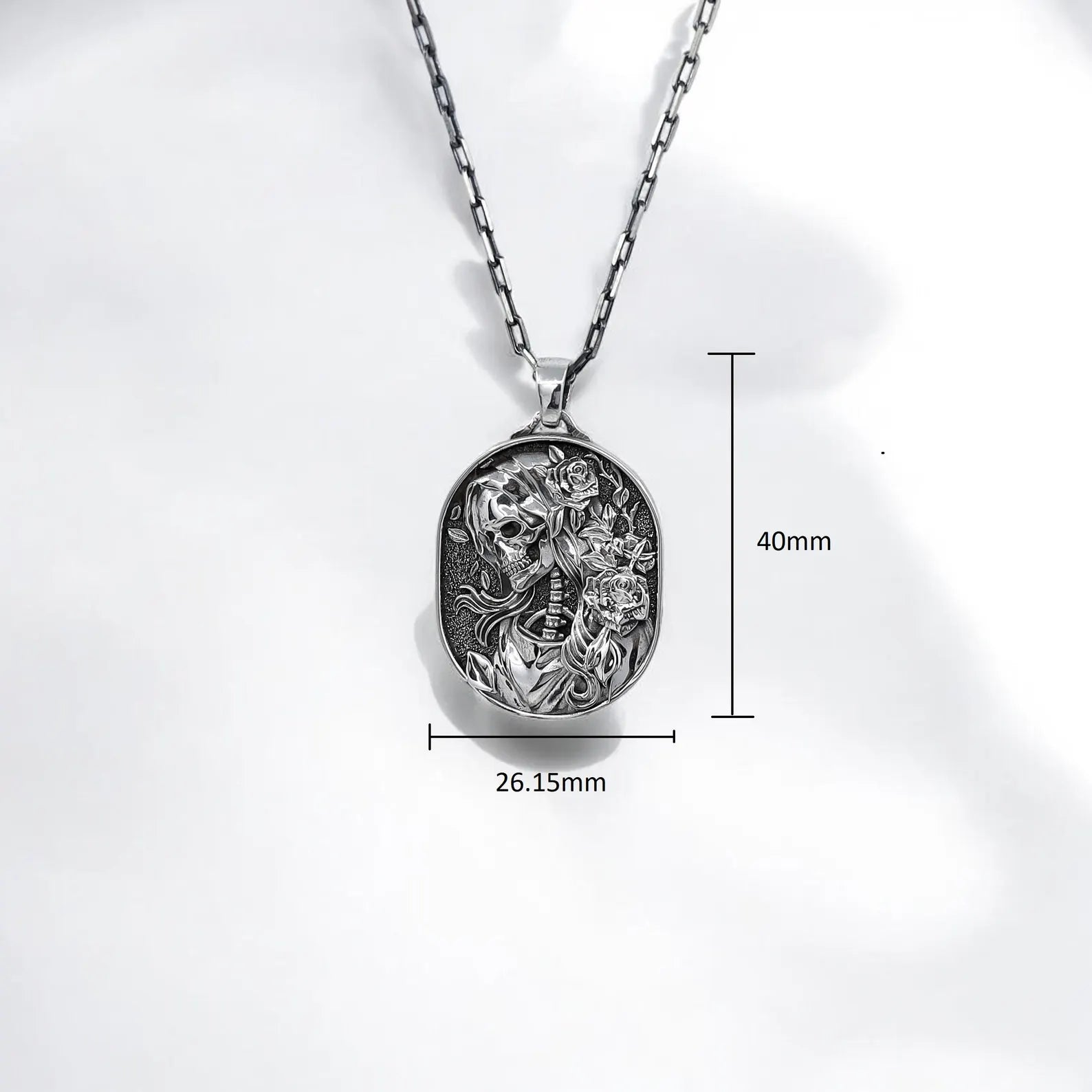 Beautifully detailed silver Gothic necklace featuring a skull portrait with floral accents. The Eternal Blossom pendant combines Day of the Dead inspiration with handcrafted artistry, making it a standout piece in any alternative fashion collection or meaningful engraved gift.
