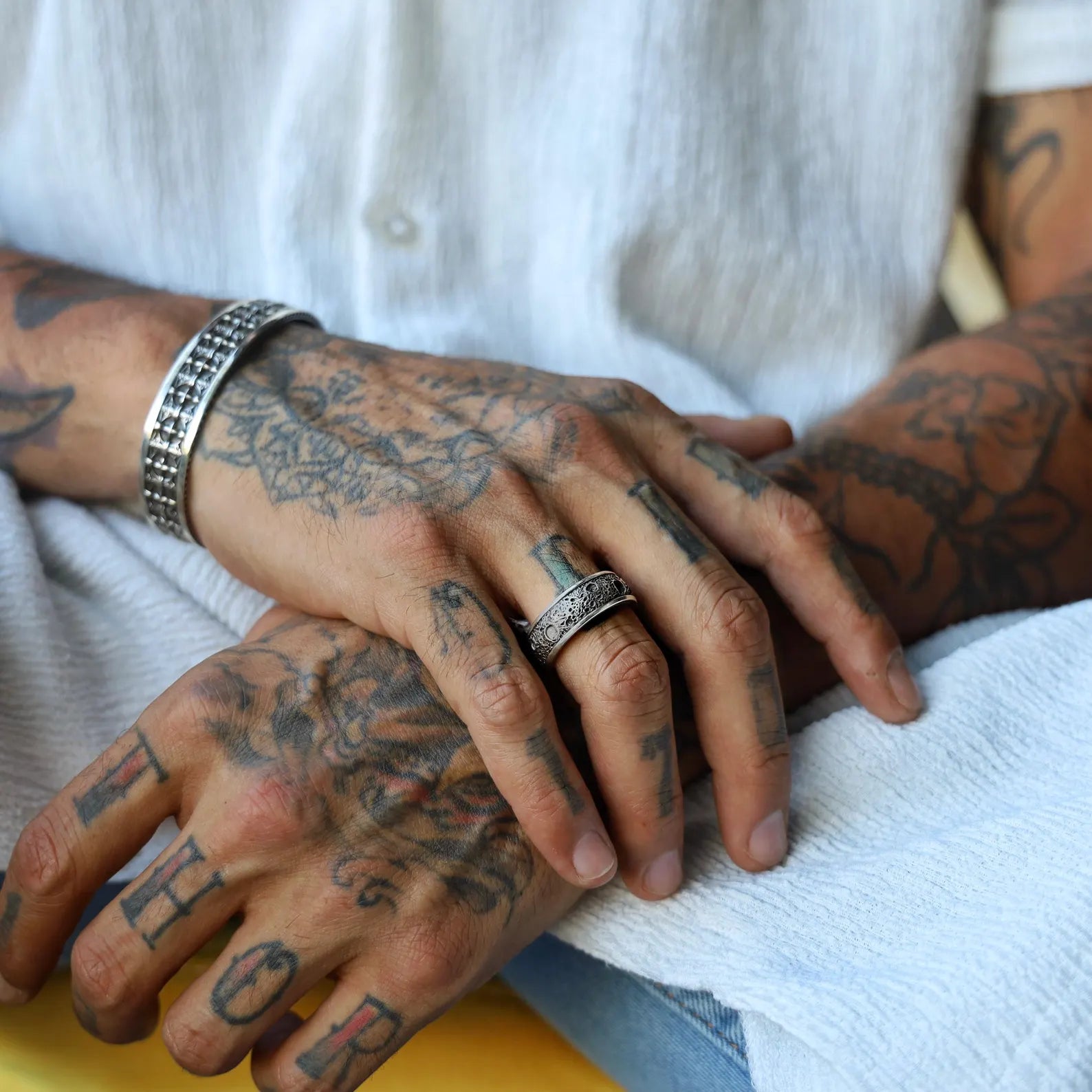 Handmade men’s silver band ring crafted in solid 925 sterling silver, showcasing a rugged, textured surface and clean edges, blending gothic inspiration with a timeless, minimalist design aesthetic.