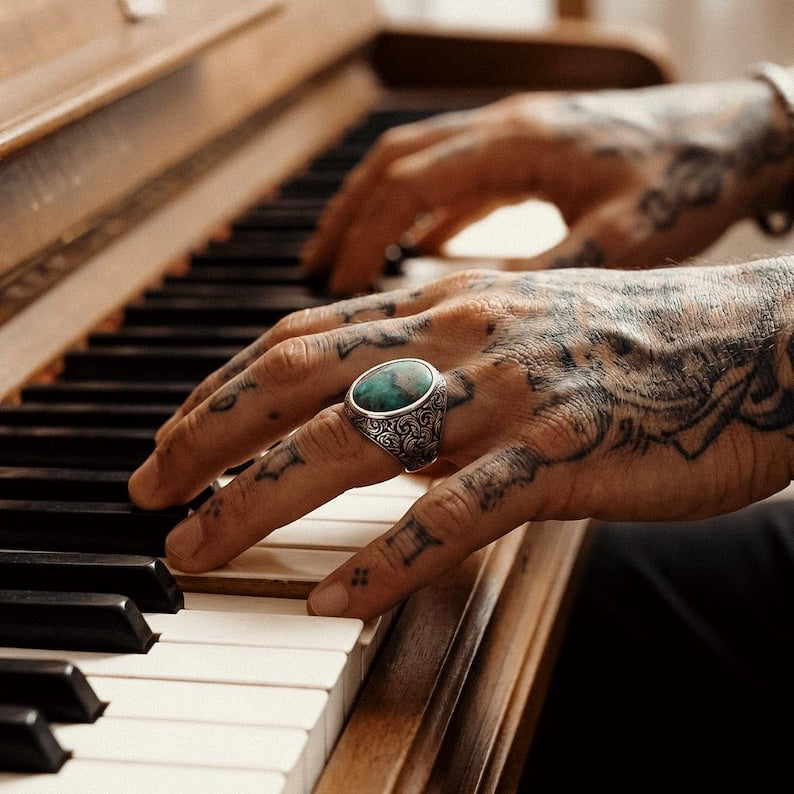 Elegant Baroque floral turquoise signet ring for men, featuring detailed hand-carved silverwork and a bold masculine vintage-inspired design