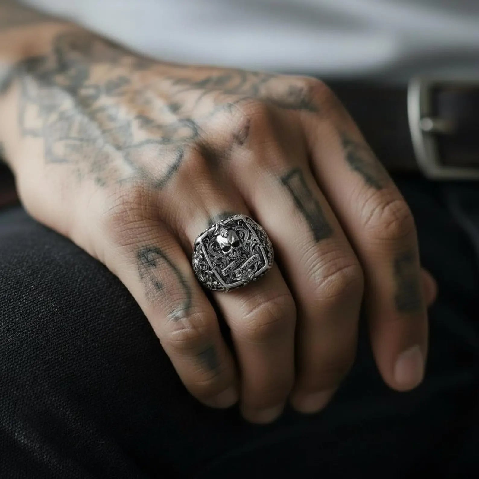 Bold jawless skull ring for men featuring baroque engravings and vintage inspired gothic biker silver craftsmanship