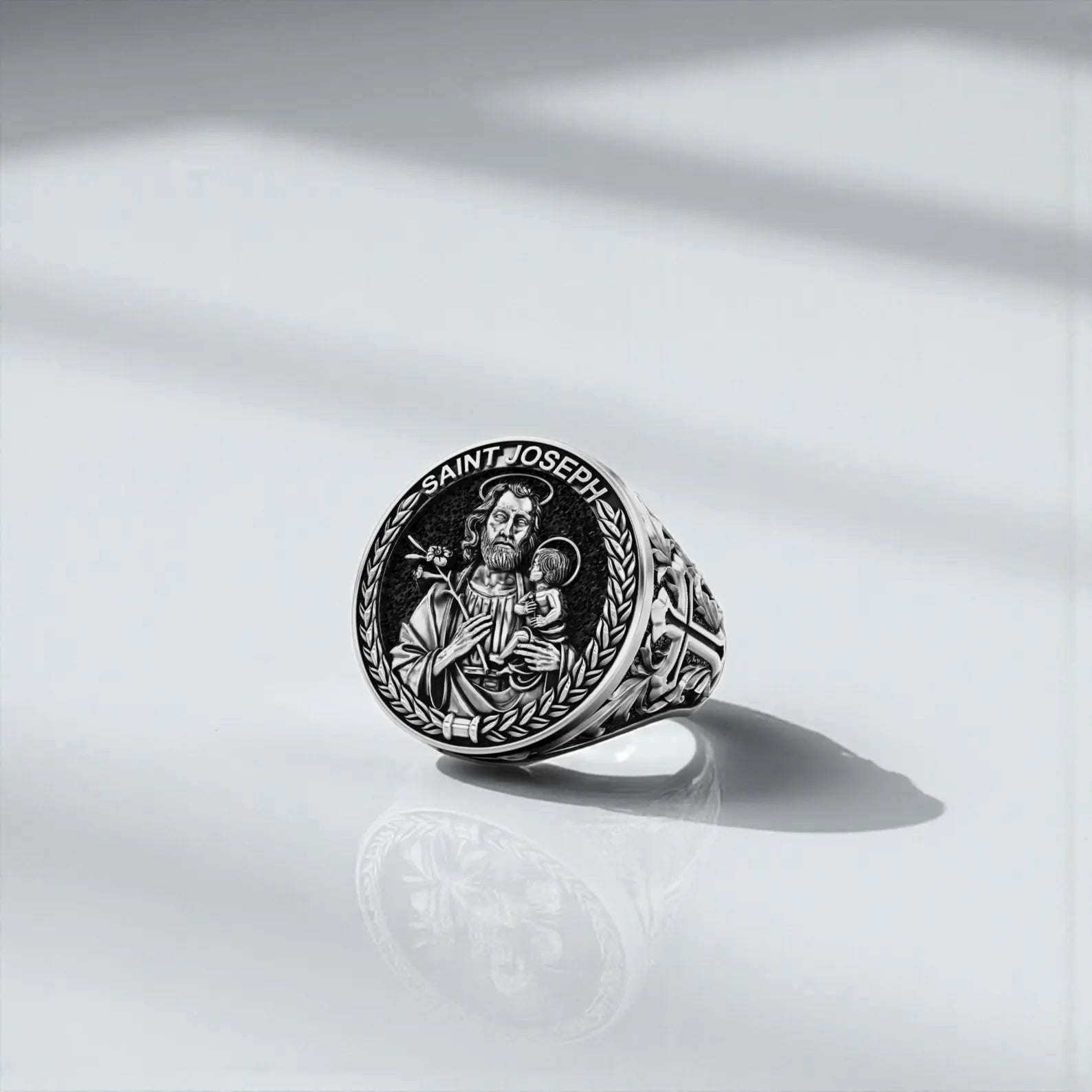Handmade Saint Joseph Christian ring for men crafted in 925 sterling silver, offering customizable engraving options such as name, date, or symbol. A thoughtful keepsake for spiritual believers.