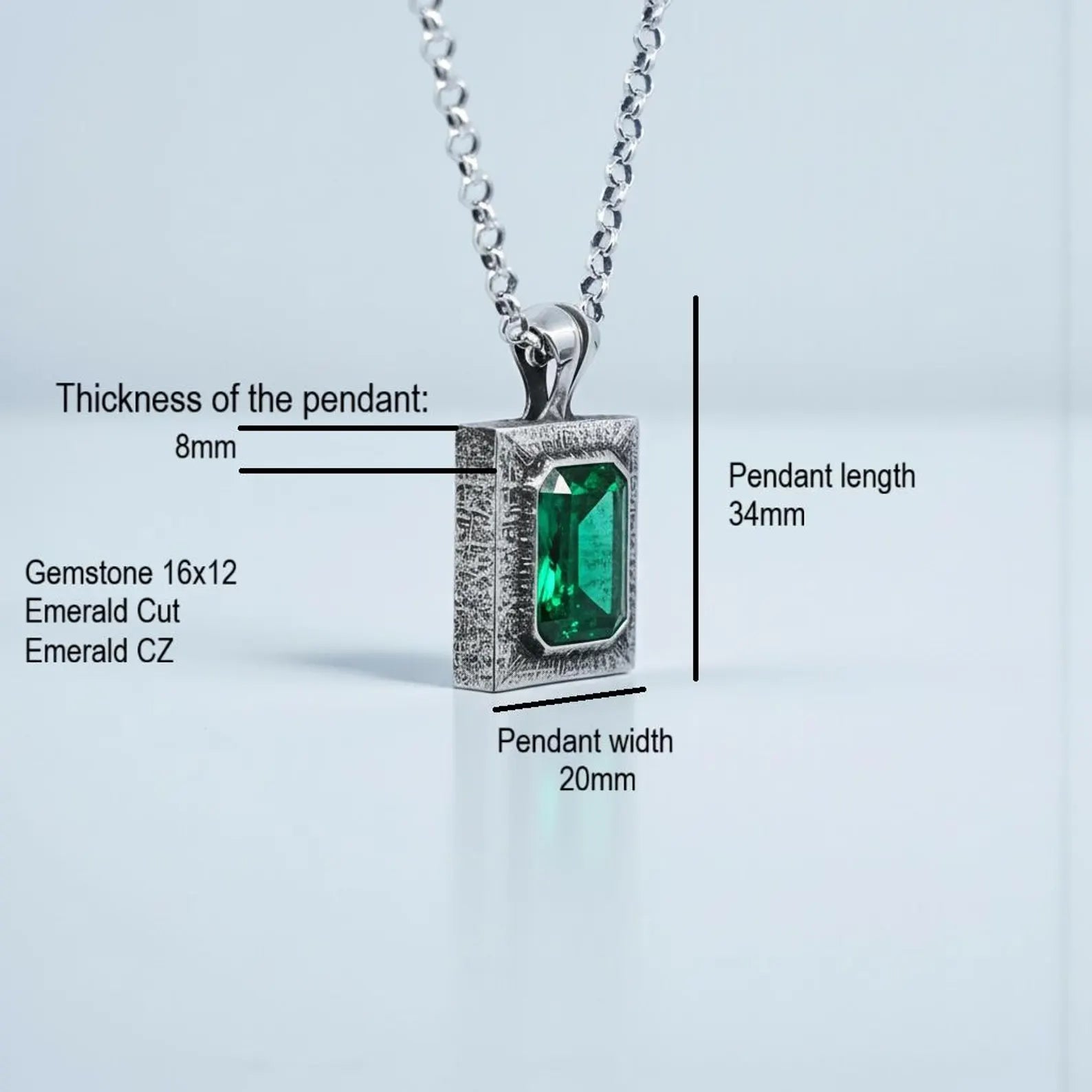 Detailed macro shot of chunky sterling silver emerald pendant featuring 16x12 cubic zirconia, handcrafted with oxidized vintage finishing, ideal as a luxury anniversary or Christmas gift for him.