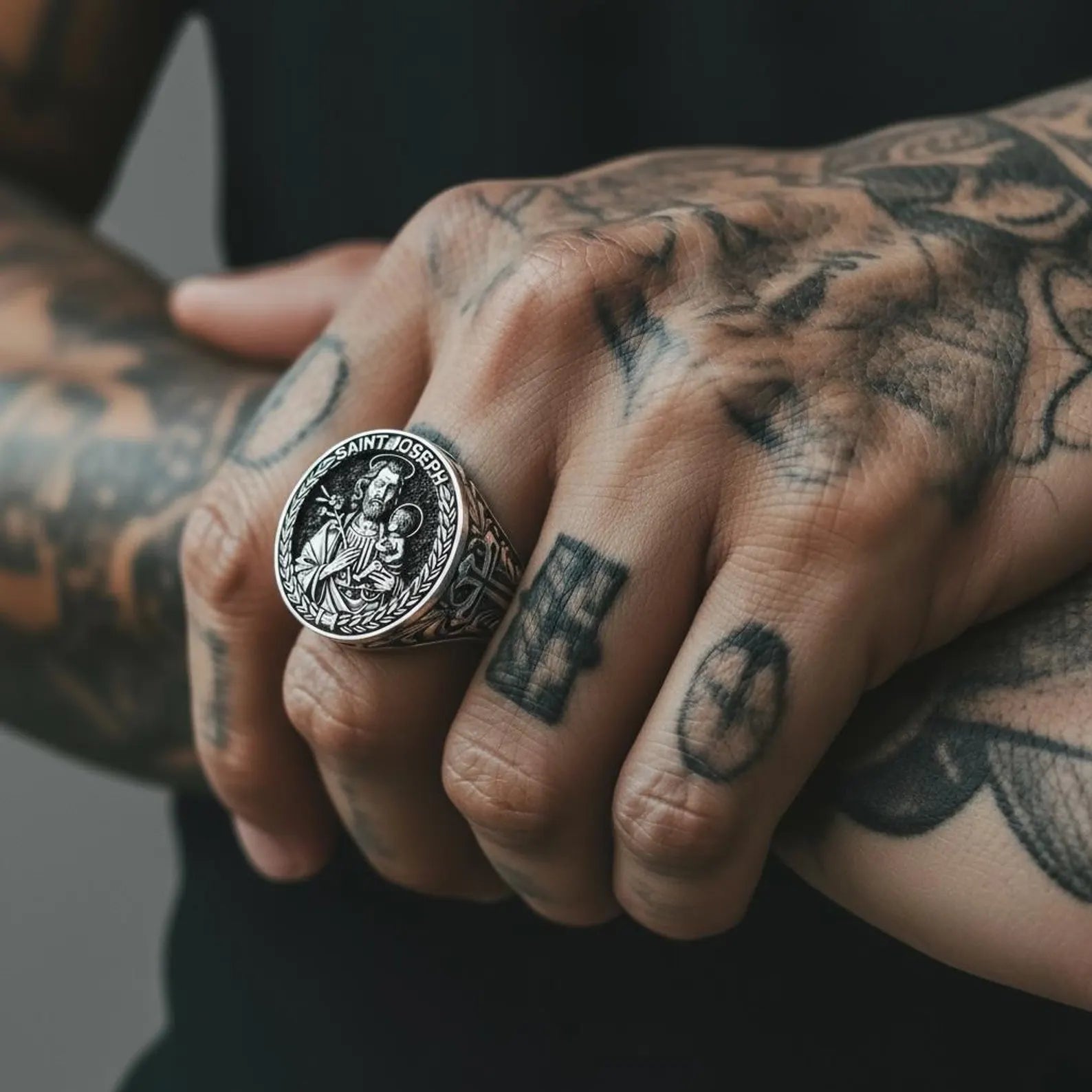 Religious Saint Joseph cross ring made from high-quality sterling silver, showcasing detailed craftsmanship and a bold statement look. Ideal as a meaningful Christian gift for husbands, boyfriends, or dads.