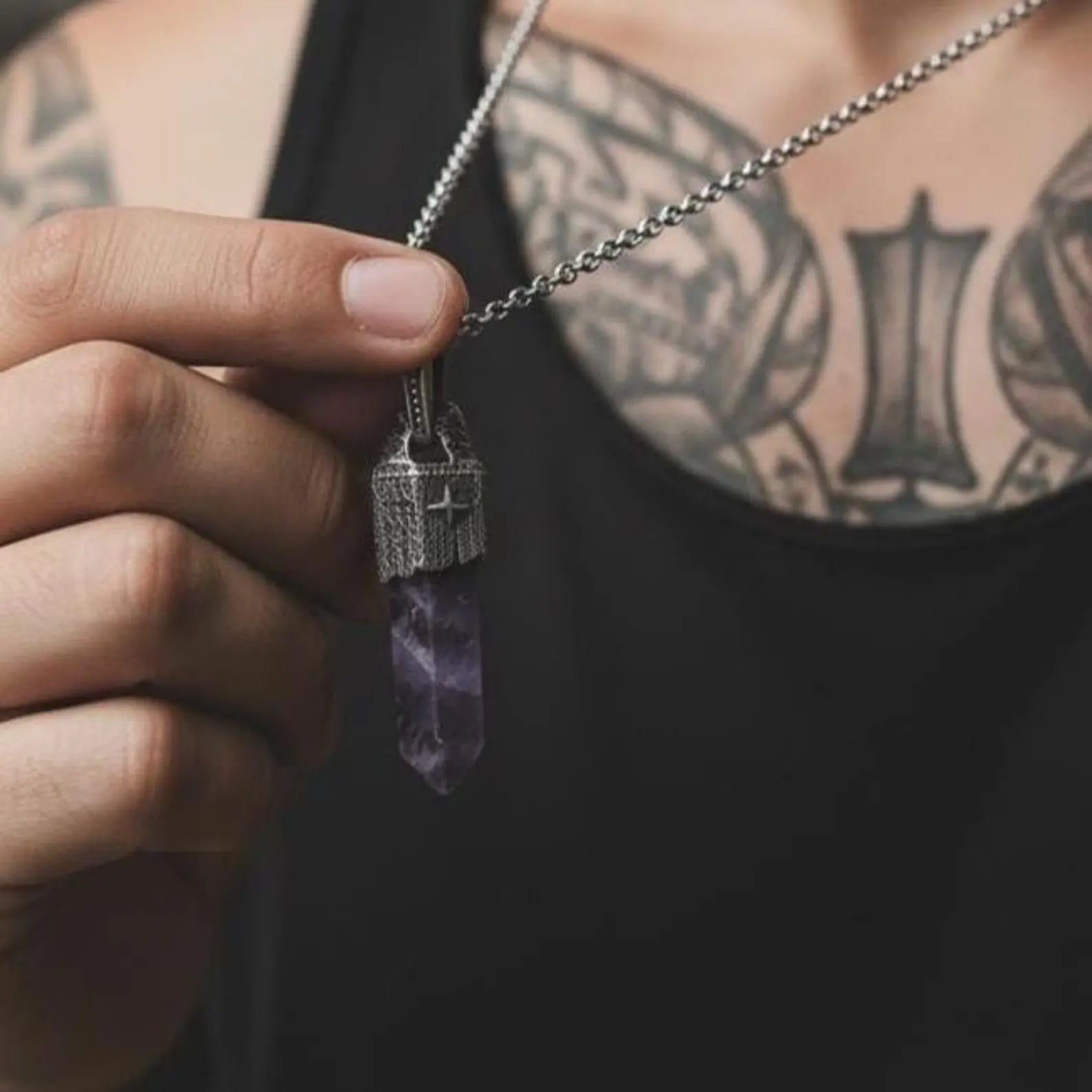 Macro close-up of a purple amethyst gemstone set in a handcrafted nautical-themed sterling silver pendant, ideal as a men’s vintage necklace gift for anniversary, Christmas, or Valentine’s Day.