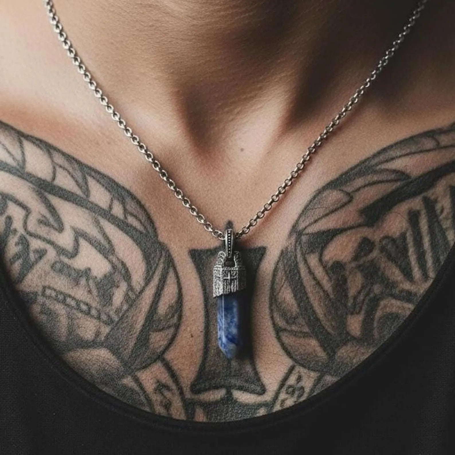 Natural blue sodalite pendant necklace handcrafted with precise sterling silver detailing, featuring a symbolic compass design that represents guidance, inner strength, life balance and emotional stability — perfect for men who appreciate meaningful jewelry.