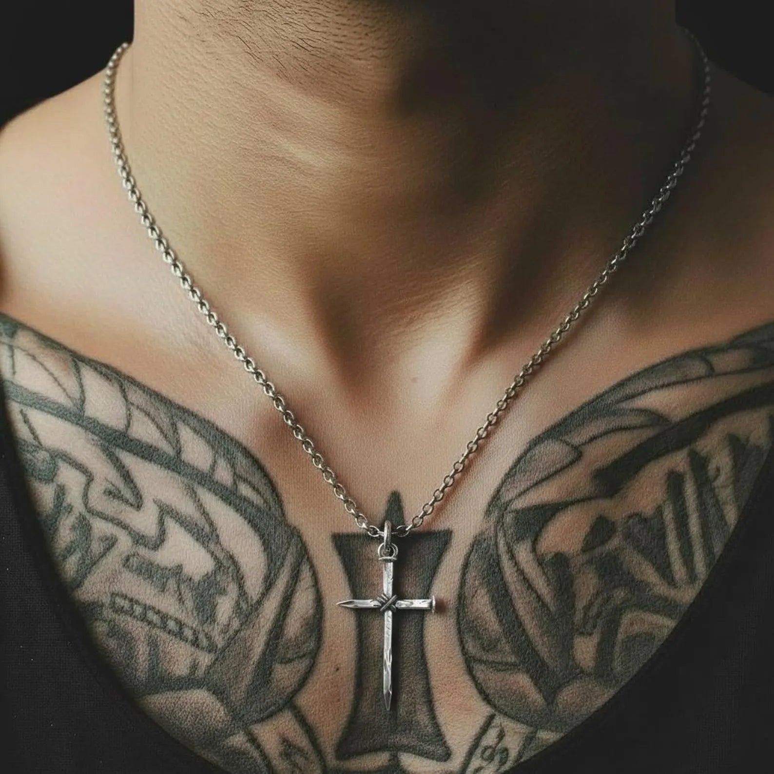 Gothic Christian cross pendant for men inspired by the nail cross symbol, representing sacrifice, belief, and timeless religious meaning in sterling silver jewelry.