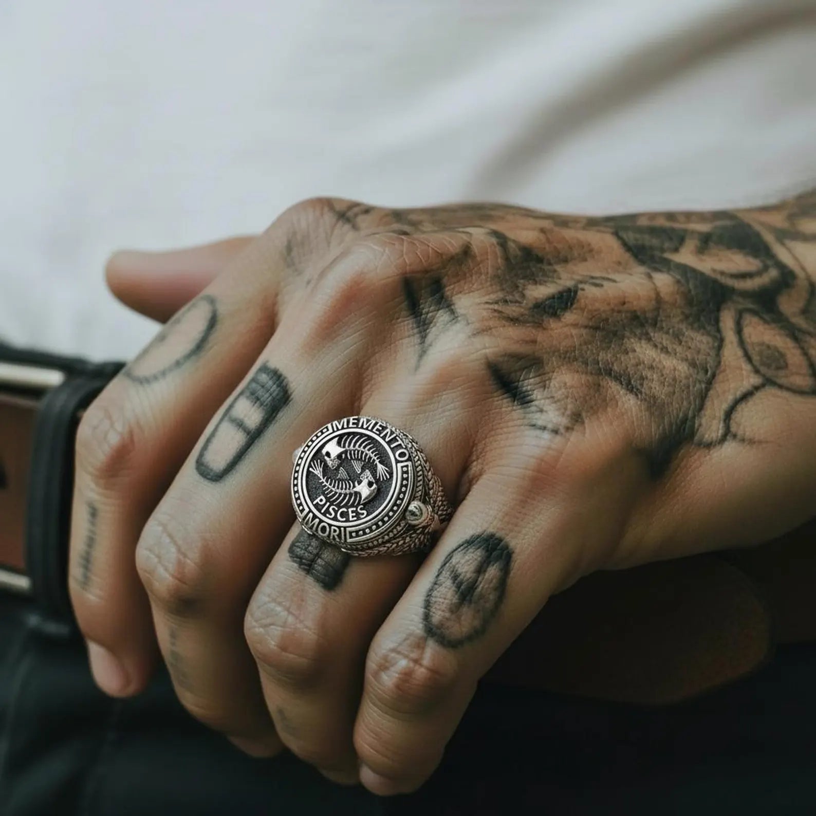 Gothic Pisces zodiac ring crafted in solid sterling silver, showcasing an intricate fish skeleton motif inspired by Memento Mori philosophy and bold biker jewelry aesthetics.