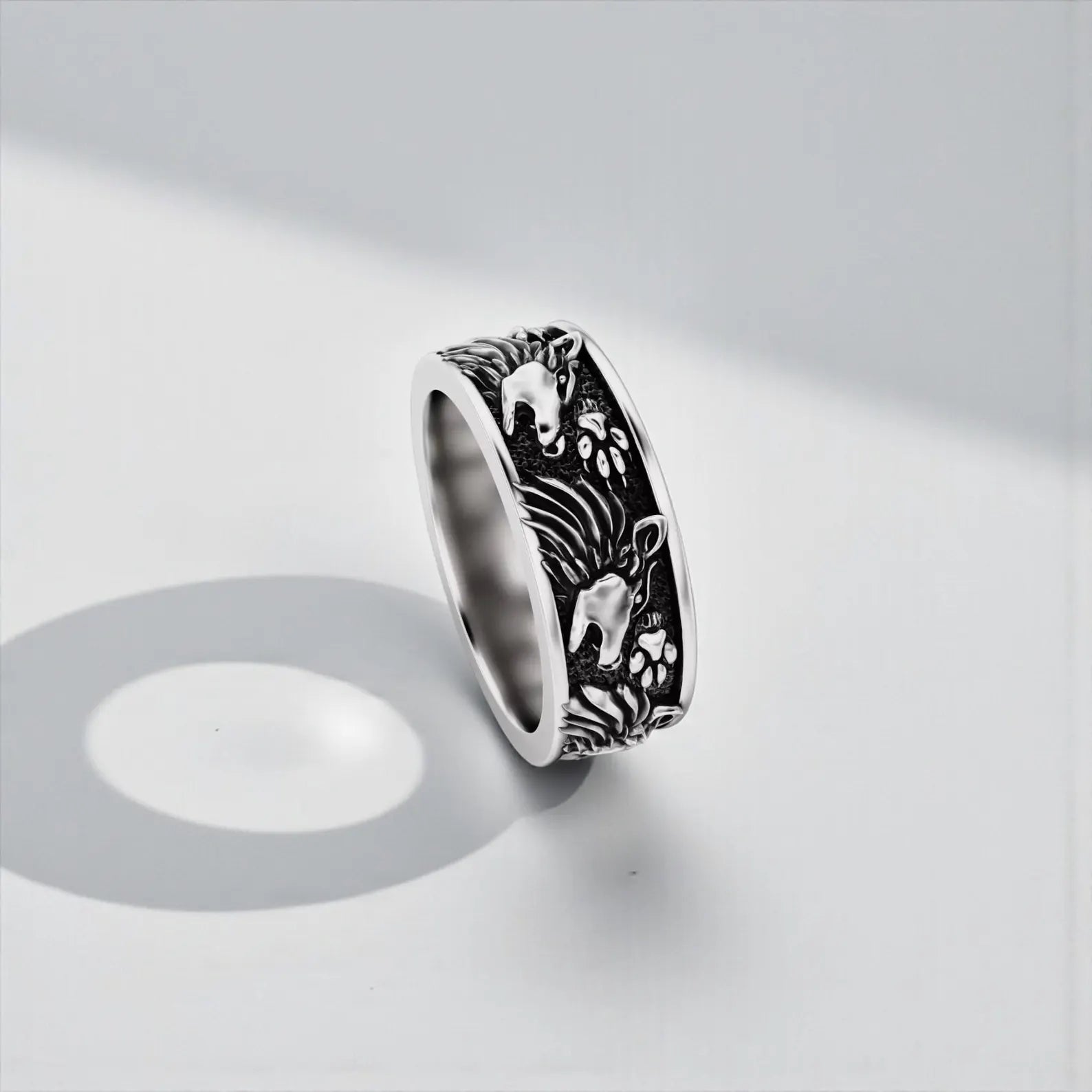 Sterling silver Viking wolf band ring with warrior symbolism, handcrafted Norse spirit jewelry for men who appreciate Viking heritage and bold statement rings