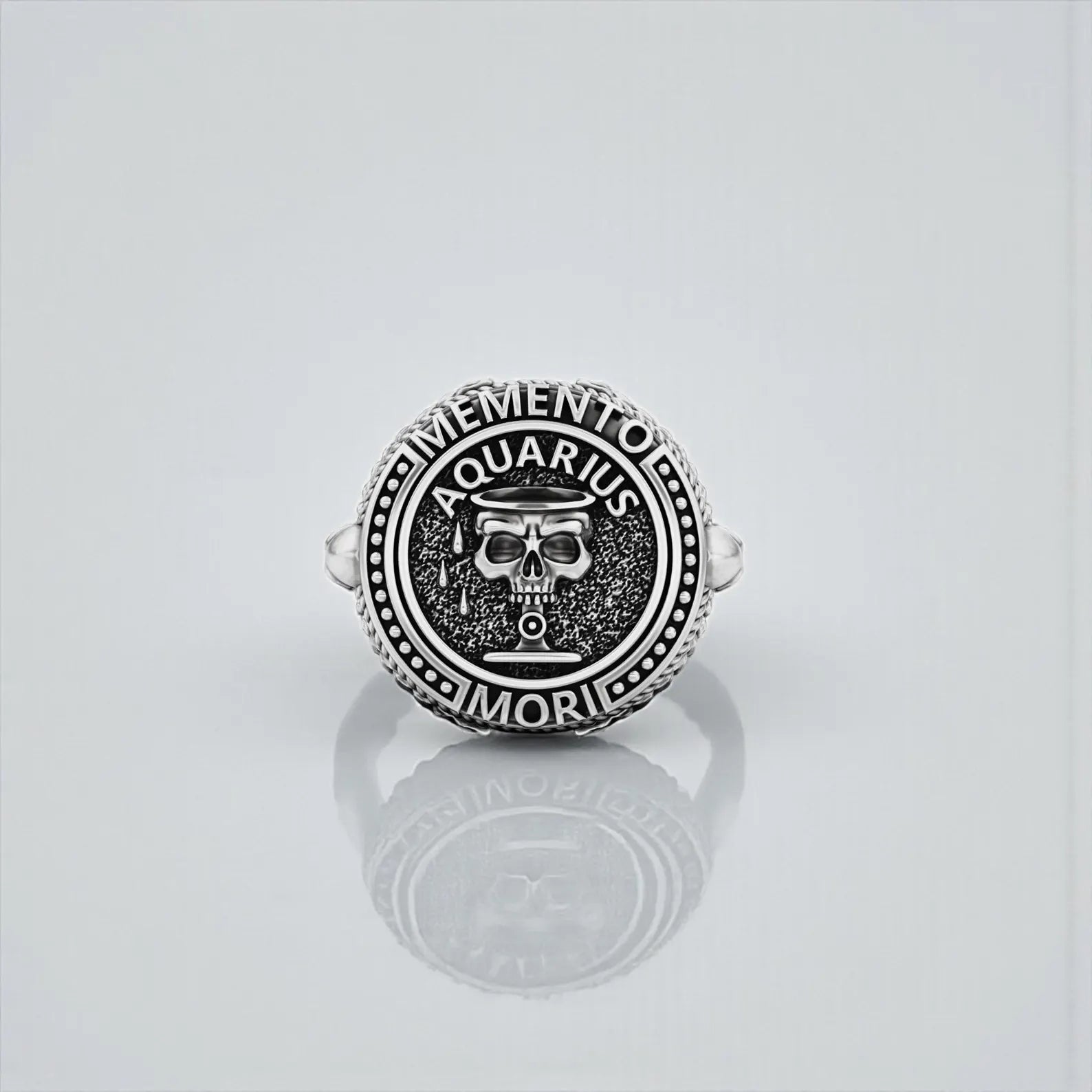High-quality sterling silver Aquarius Memento Mori ring designed with a skull motif, combining gothic biker style with deep astrological and philosophical meaning.
