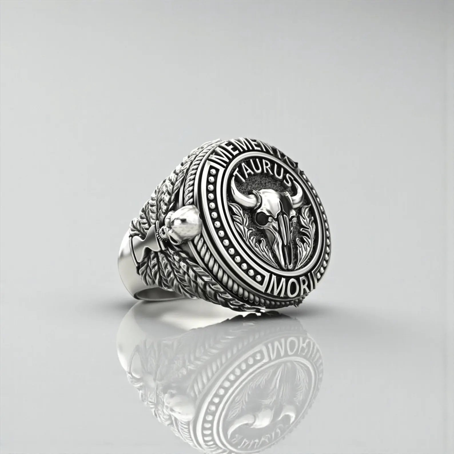Handcrafted Taurus zodiac ring for men featuring a Memento Mori bull skull motif, oxidized silver finish, and detailed engravings reflecting strength and timeless masculine style.