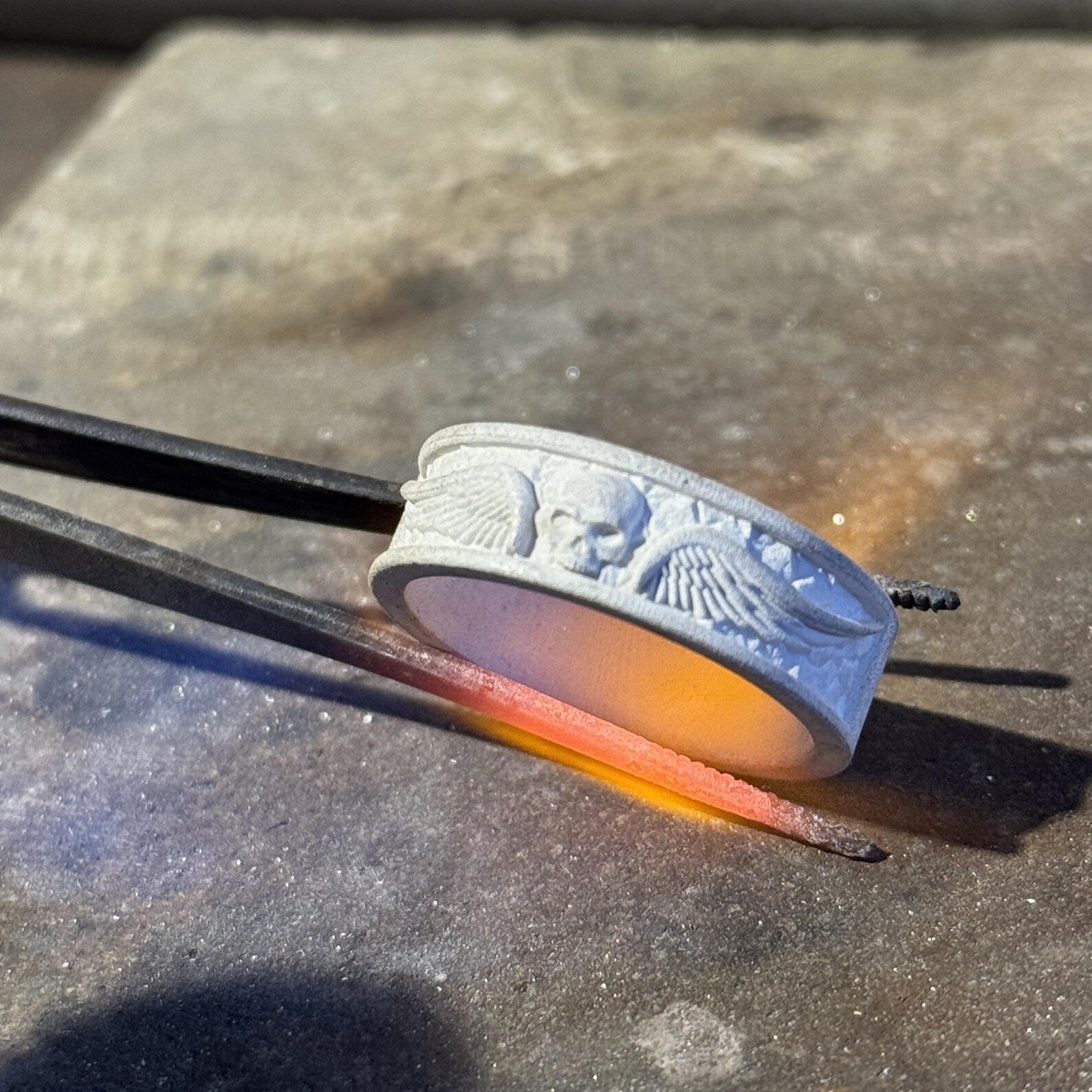 Handcrafted sterling silver skull band ring, 100% handmade using traditional silversmith techniques, designed as a bold skull band ring with detailed craftsmanship and a timeless gothic style.