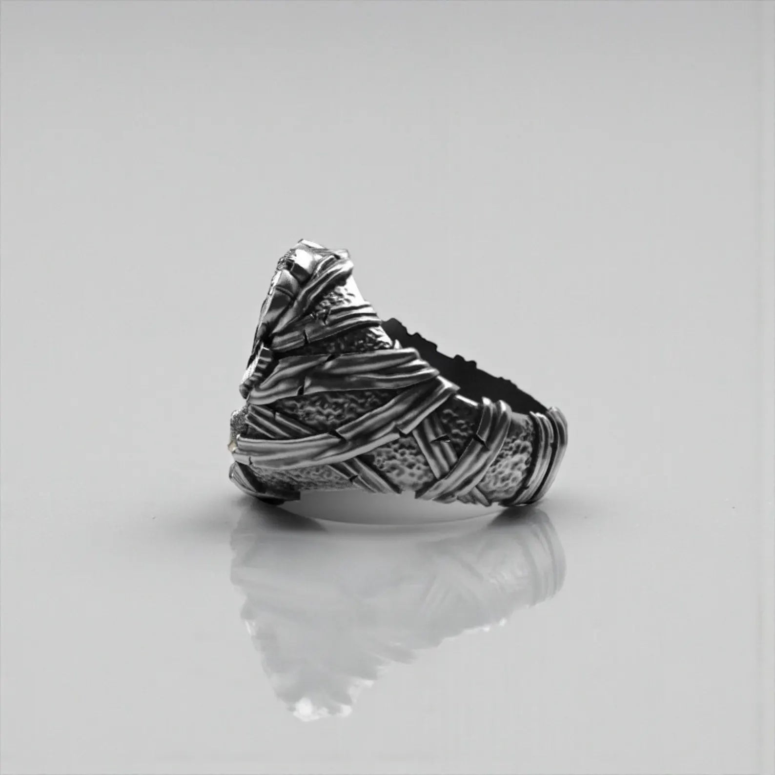 Solid 925 sterling silver skull and eagle ring featuring bold relief work and handcrafted details, created as a unique gothic biker accessory.