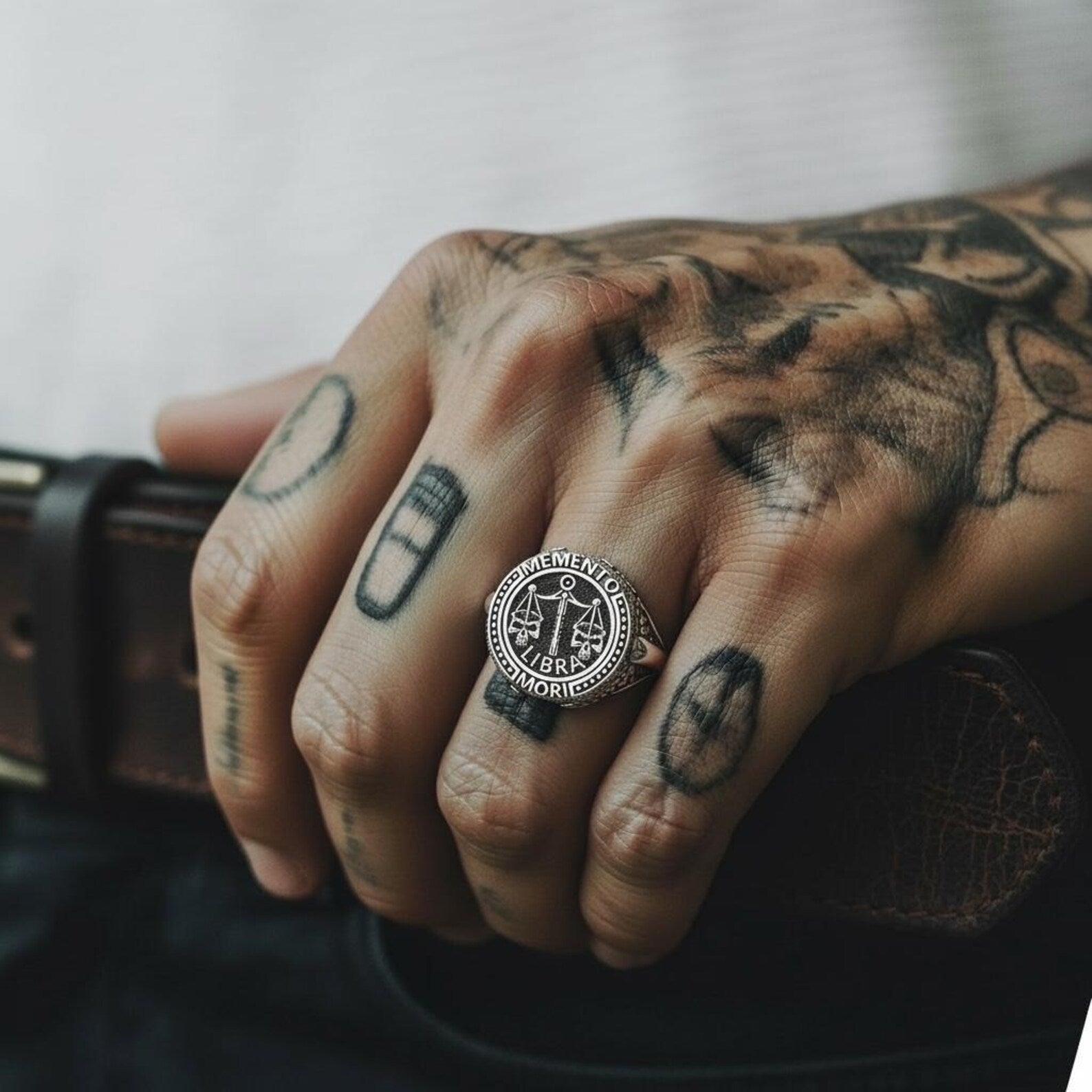 Gothic Libra zodiac ring crafted in solid sterling silver, showcasing a detailed skull and scale motif inspired by Memento Mori philosophy and bold biker jewelry style.