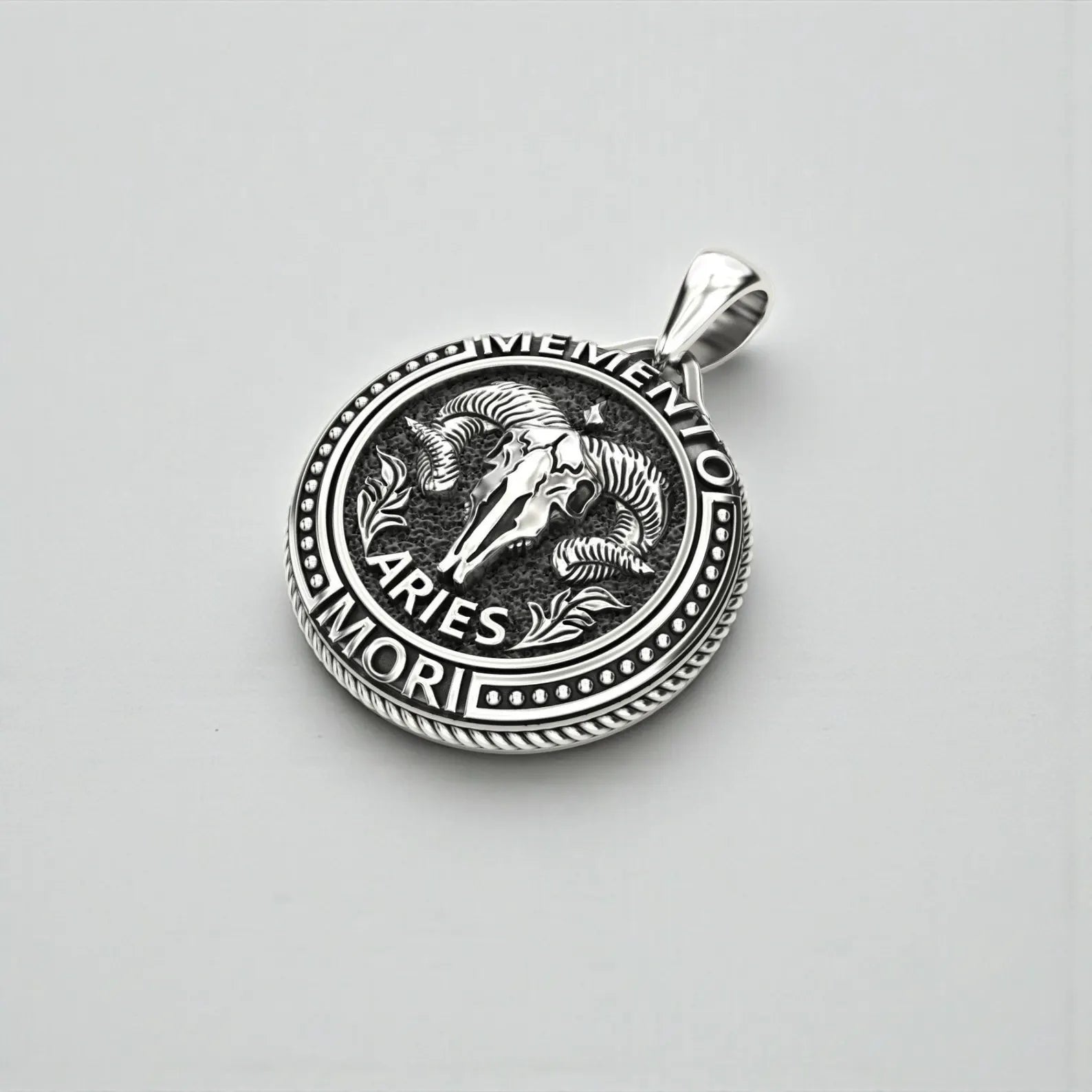 Aries zodiac goat pendant necklace in 925 sterling silver, dark gothic aesthetic with oxidized details, biker-inspired Memento Mori astrology jewelry.