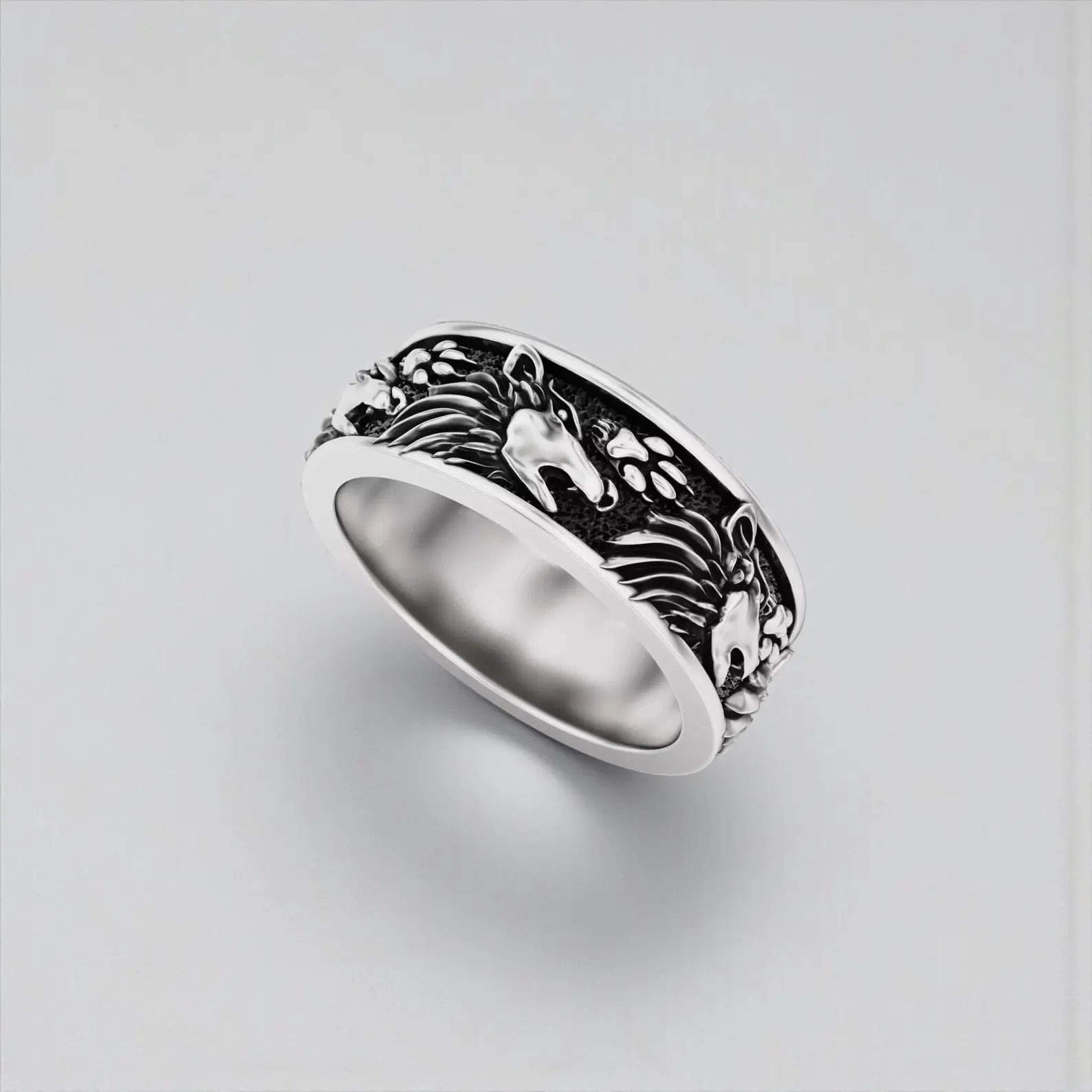 Masculine Viking wolf ring in sterling silver, handcrafted Norse mythology jewelry featuring wolf symbols of loyalty, courage and fearless spirit