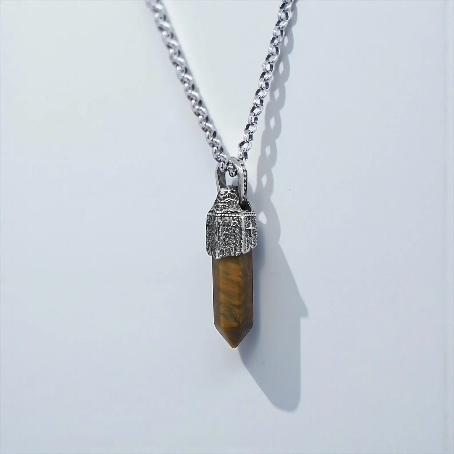 Vintage style tiger’s eye crystal compass pendant necklace made from 925 sterling silver, ideal for masculine, spiritual, and nautical jewelry lovers
