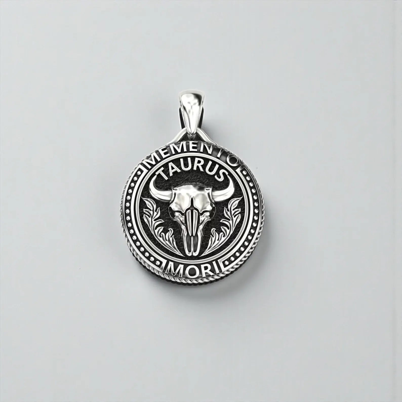 Sterling silver Taurus zodiac pendant with bold bull design, combining memento mori symbolism, dark gothic style, and masculine biker jewelry aesthetics