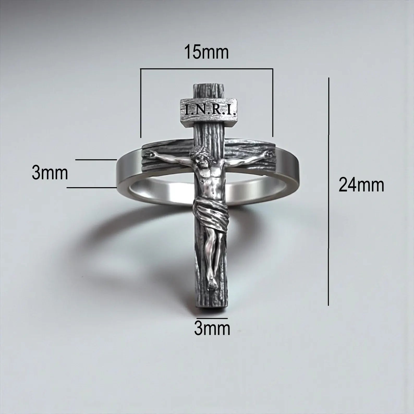 Sterling silver Jesus crucifix cross ring with handcrafted detailing, sacred Christian jewelry piece designed as a powerful religious statement ring for men